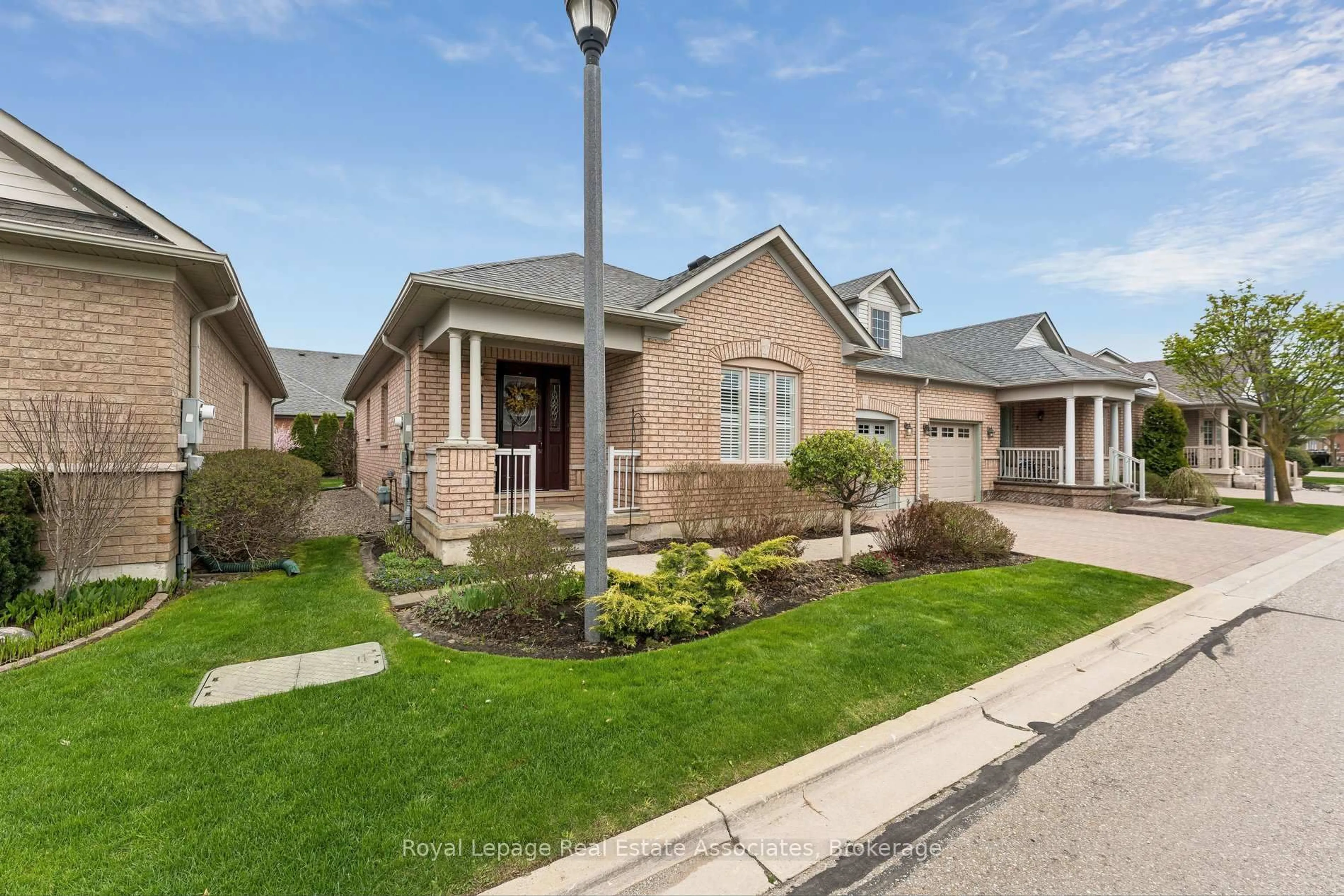 Home with brick exterior material, street for 9 Falconwood Pl, Brampton Ontario L6R 3J3