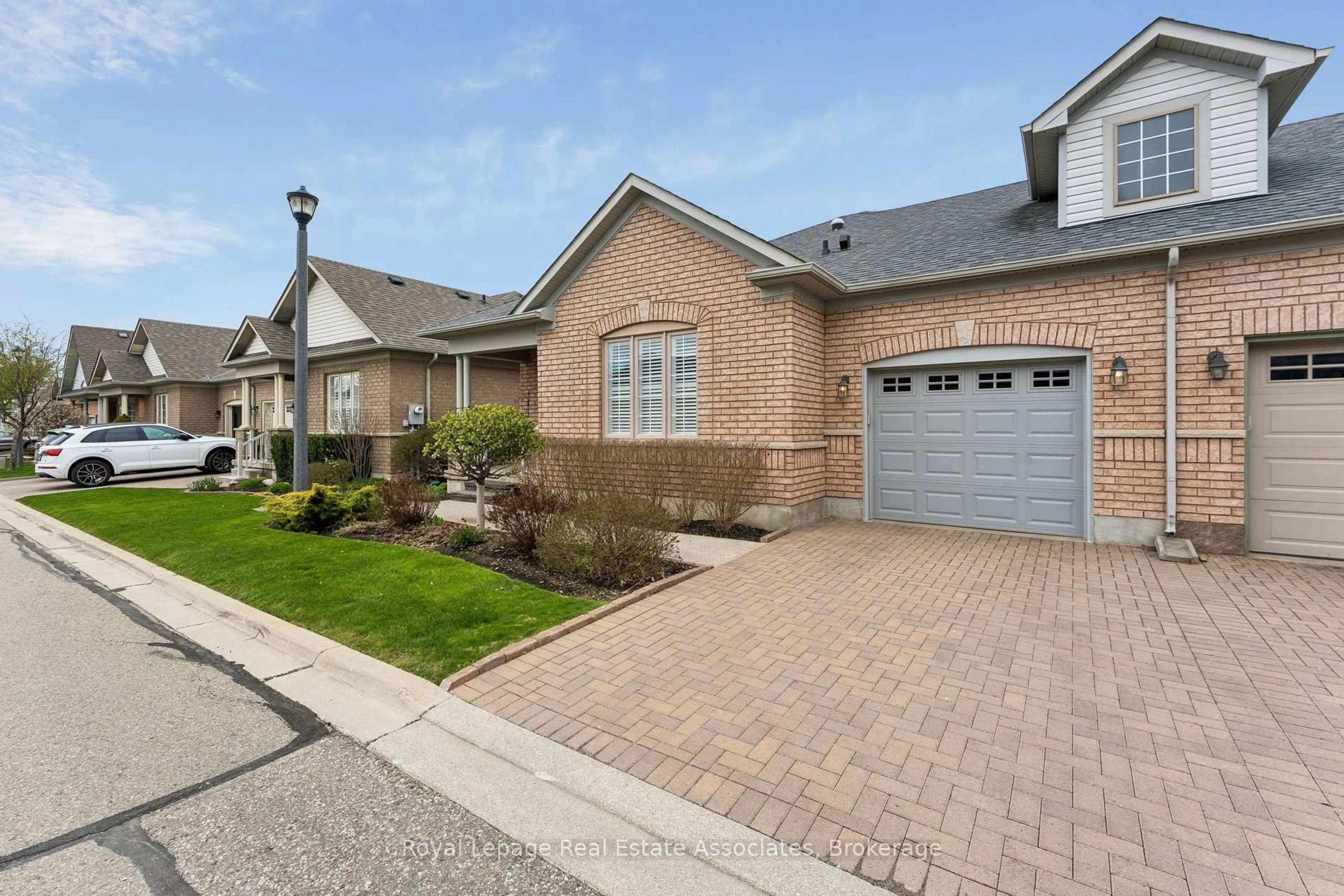 Home with brick exterior material, street for 9 Falconwood Pl, Brampton Ontario L6R 3J3