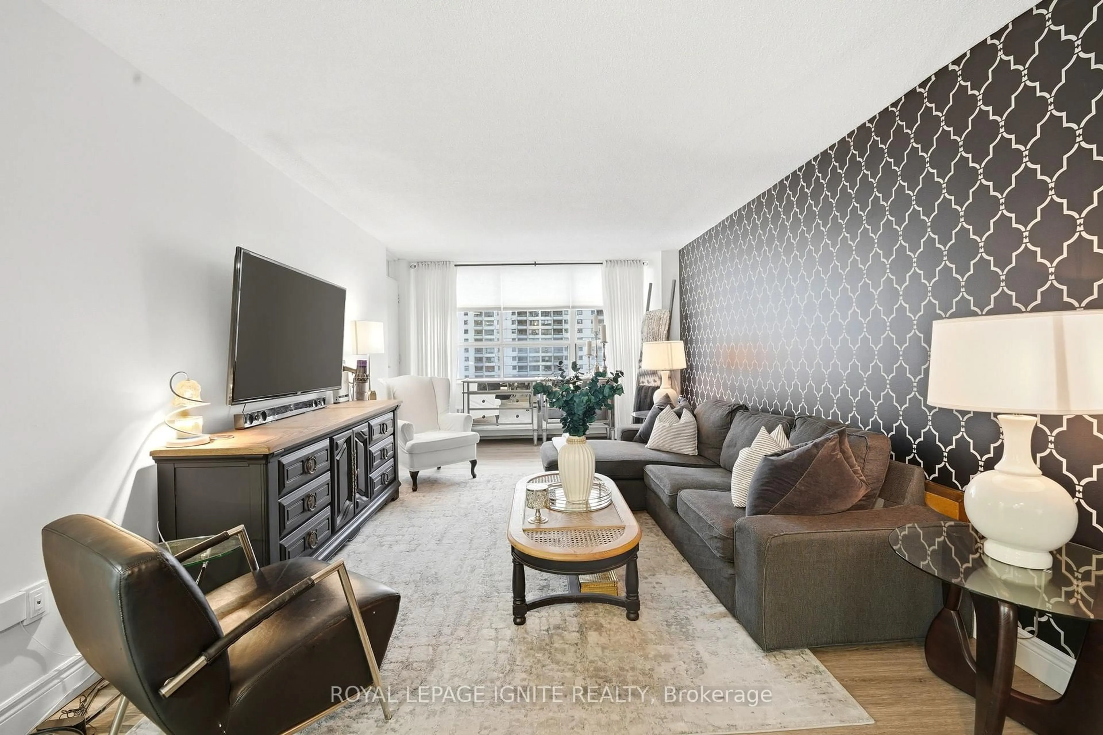 Living room with furniture, unknown for 370 Dixon Rd #714, Toronto Ontario M9R 1T2
