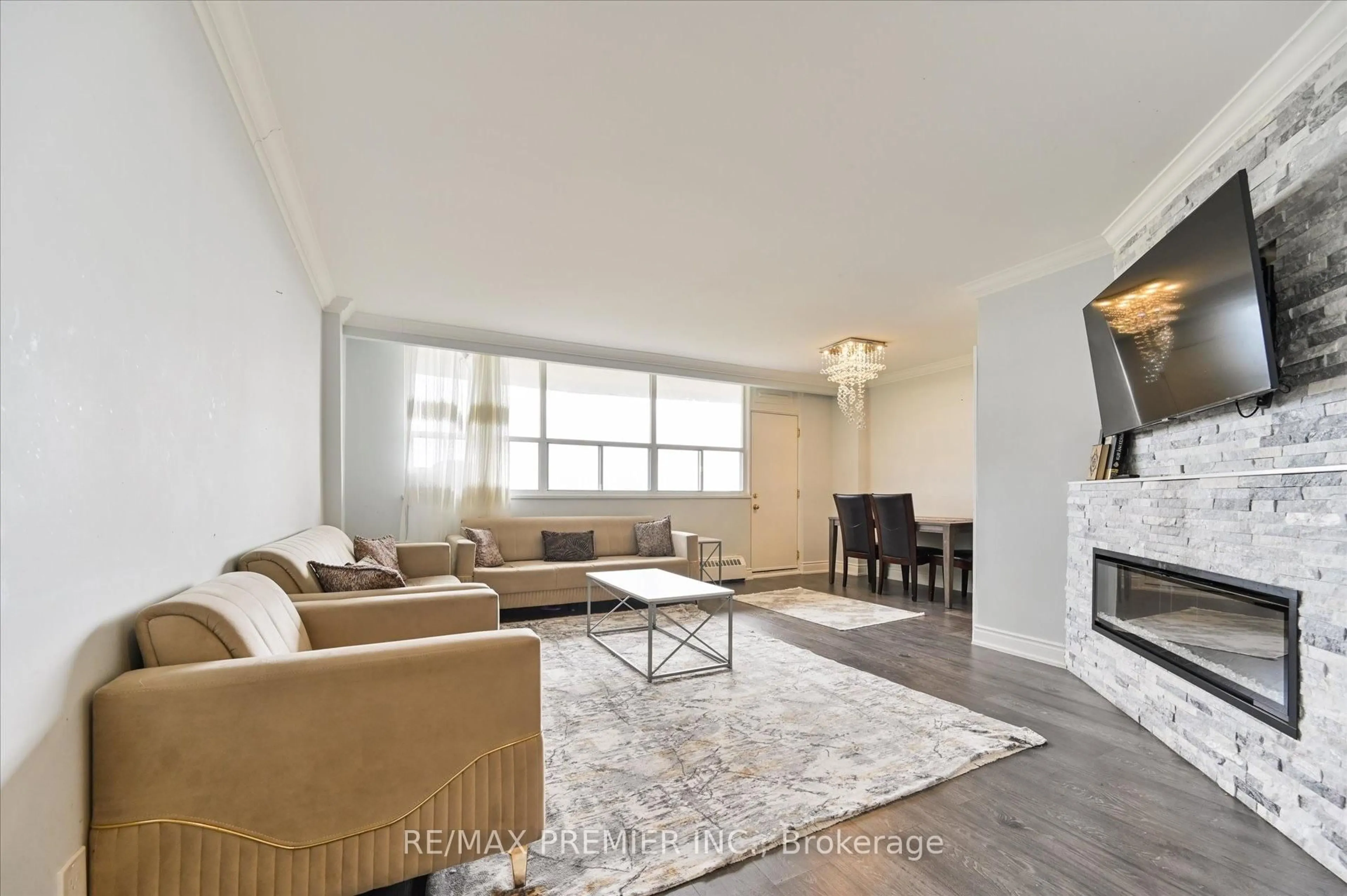 Living room with furniture, unknown for 80 Grandravine Dr #716, Toronto Ontario M3J 1B2
