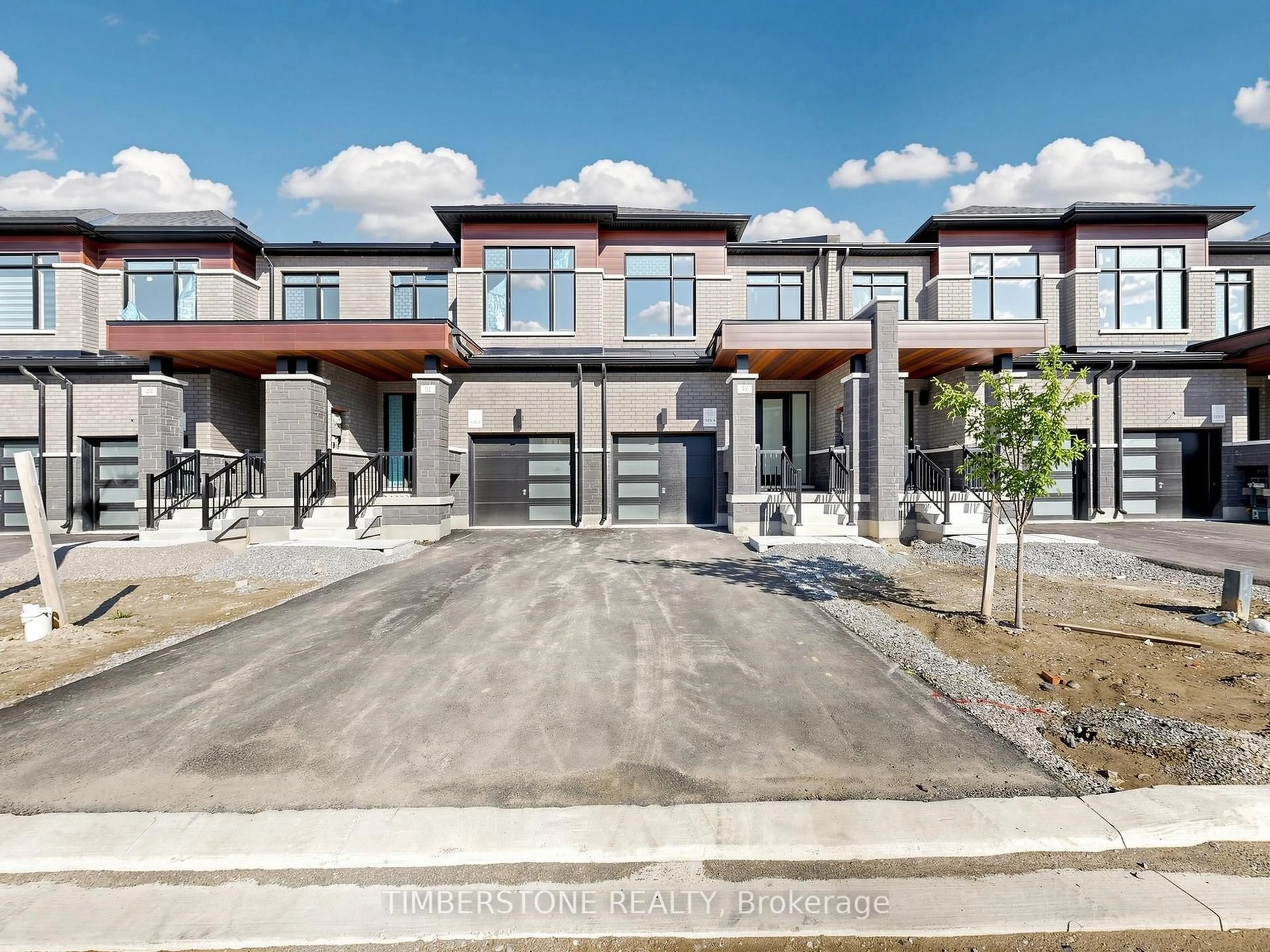 Home with brick exterior material, street for 51 Freedom Oaks Tr, Brampton Ontario L6P 4R8
