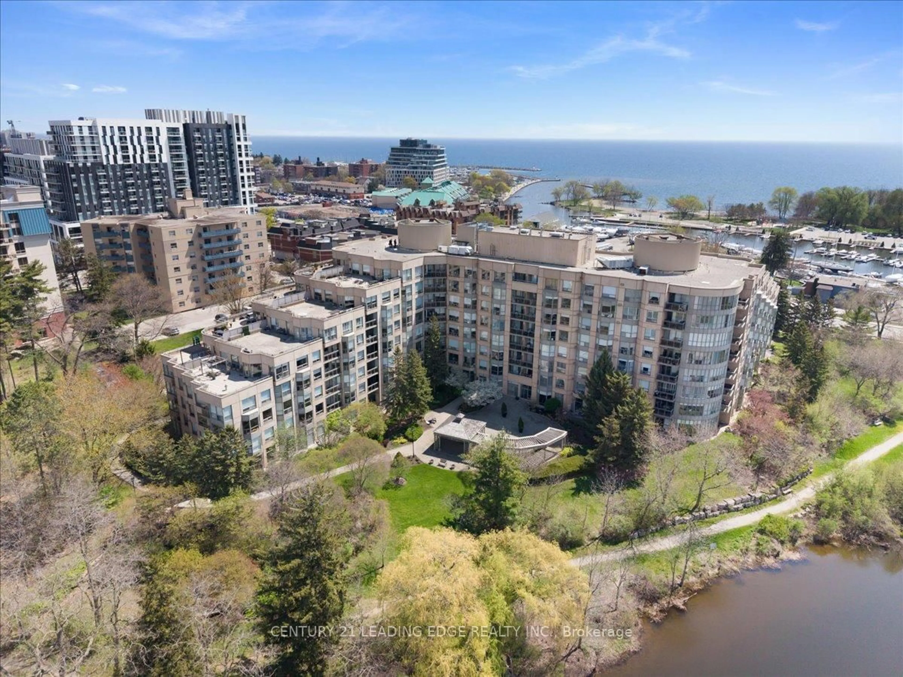 A pic from outside/outdoor area/front of a property/back of a property/a pic from drone, water/lake/river/ocean view for 2511 Lakeshore Rd #719, Oakville Ontario L6L 6L9