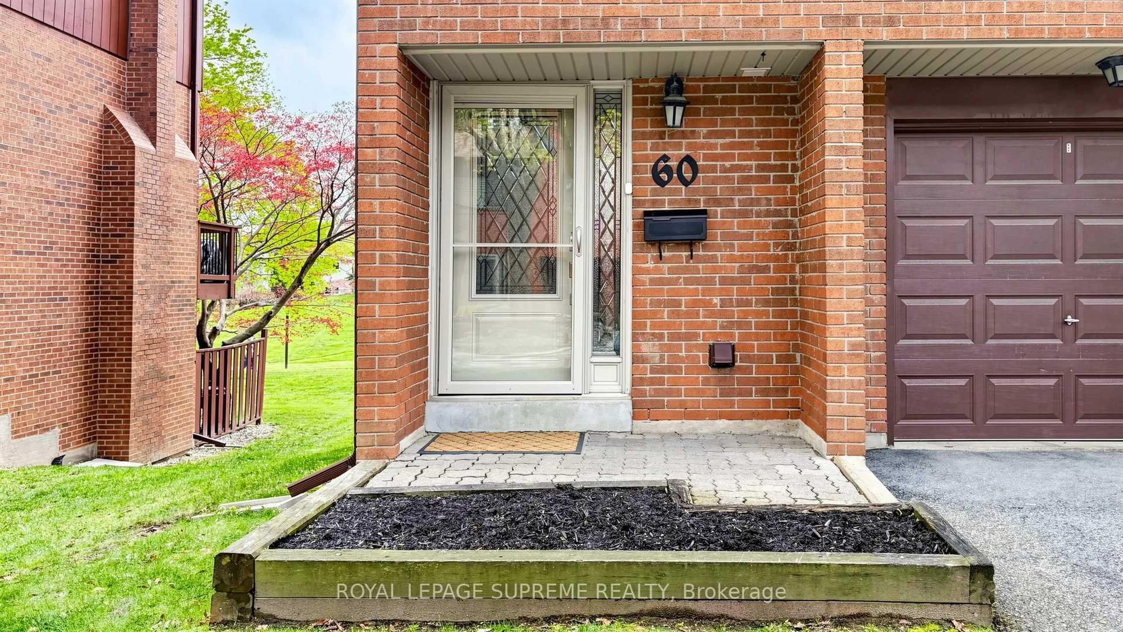 Home with brick exterior material, street for 4165 Fieldgate Dr #60, Mississauga Ontario L4W 2M9