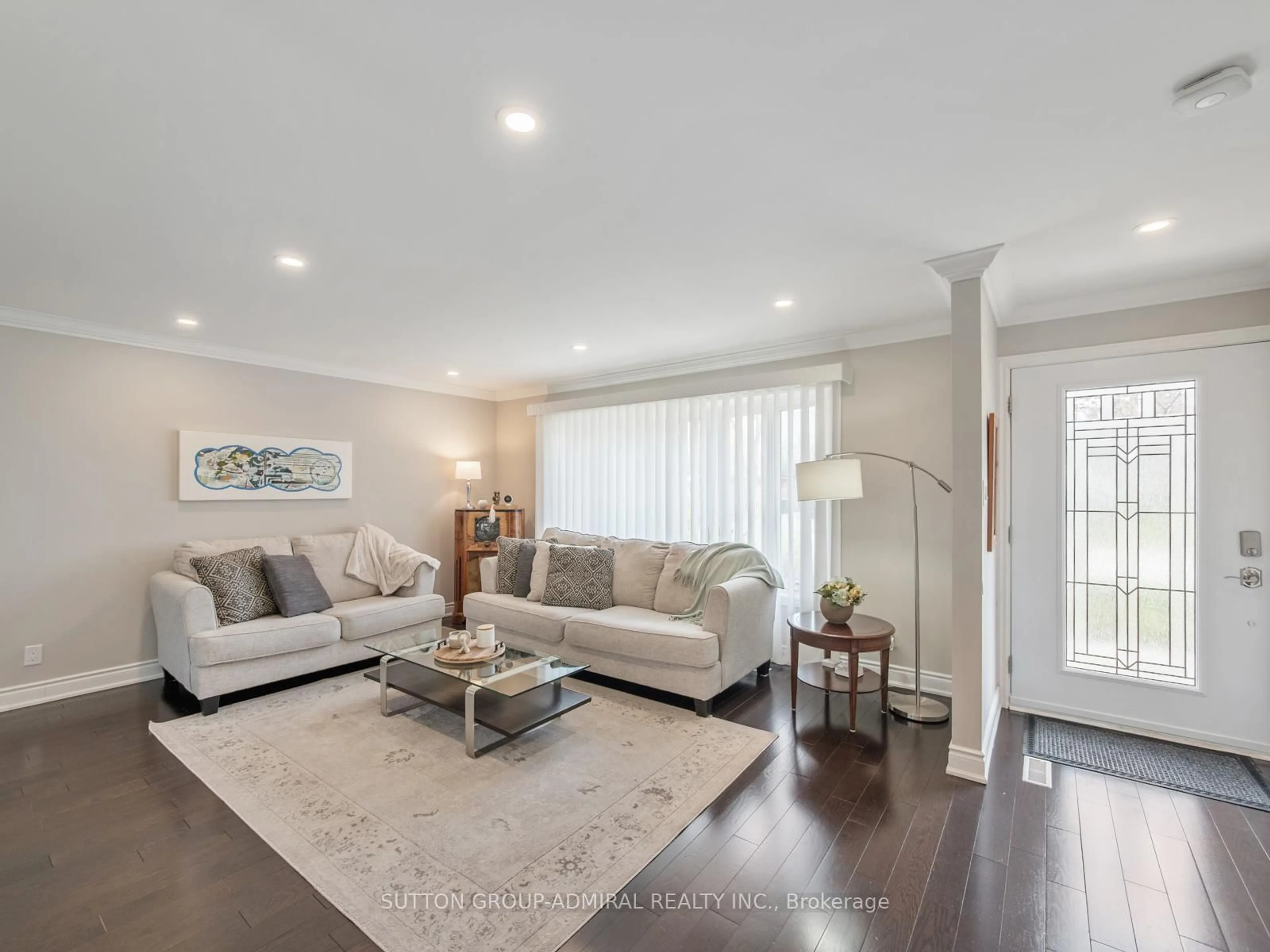 Living room with furniture, wood/laminate floor for 196 Dale St, Caledon Ontario L7E 3W5