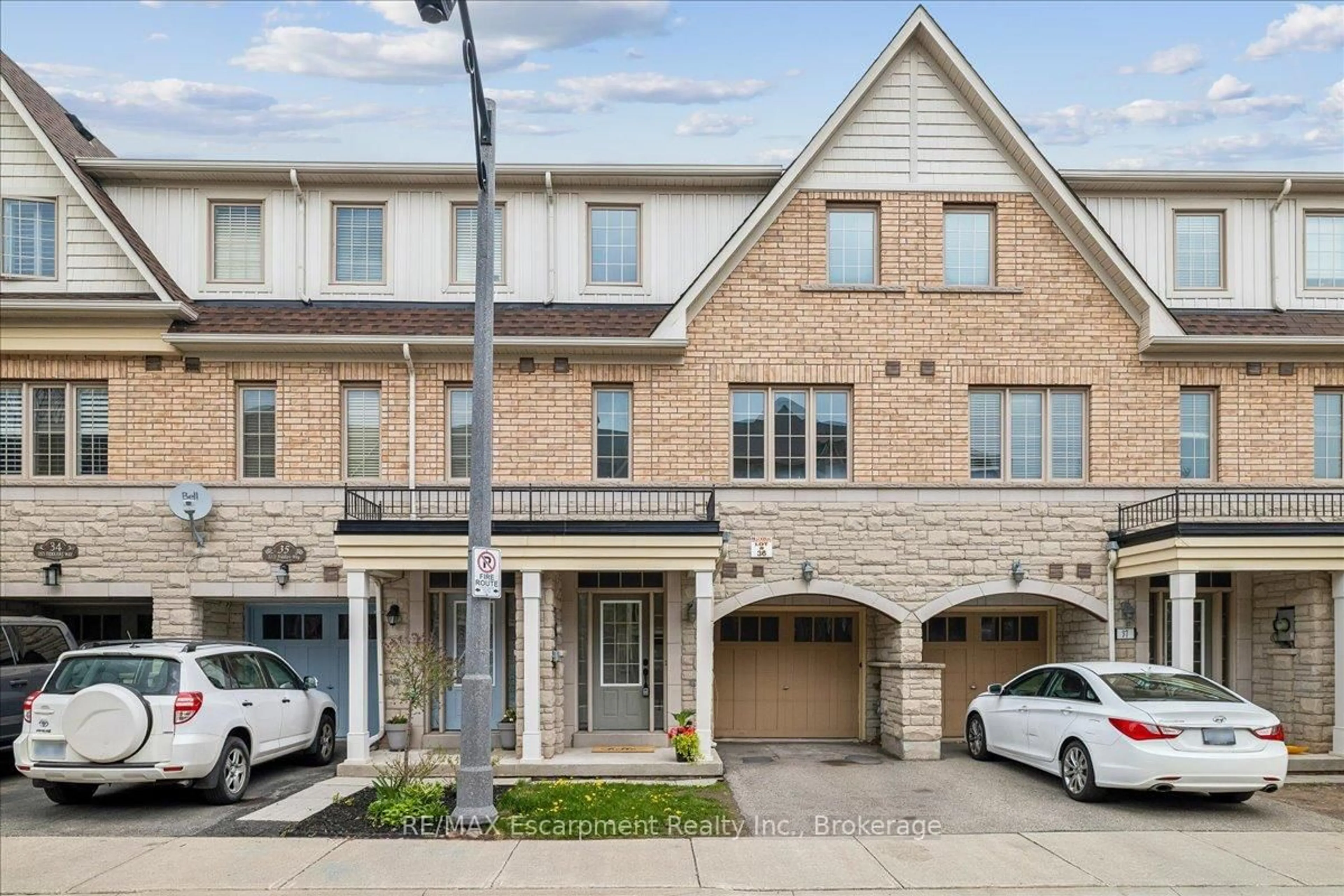 Home with brick exterior material, street for 2171 Fiddlers Way #36, Oakville Ontario L6M 0R9