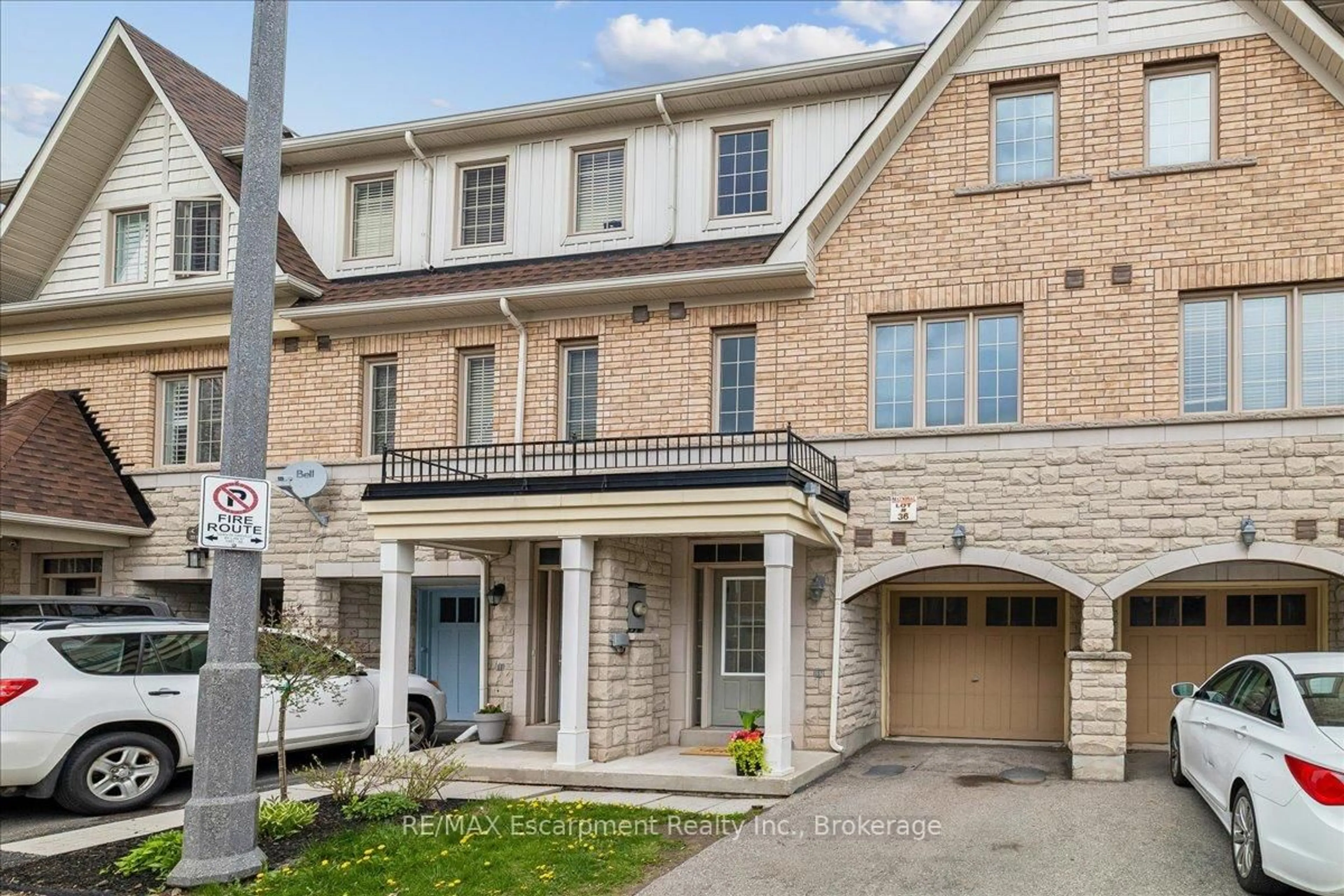 Home with brick exterior material, street for 2171 Fiddlers Way #36, Oakville Ontario L6M 0R9