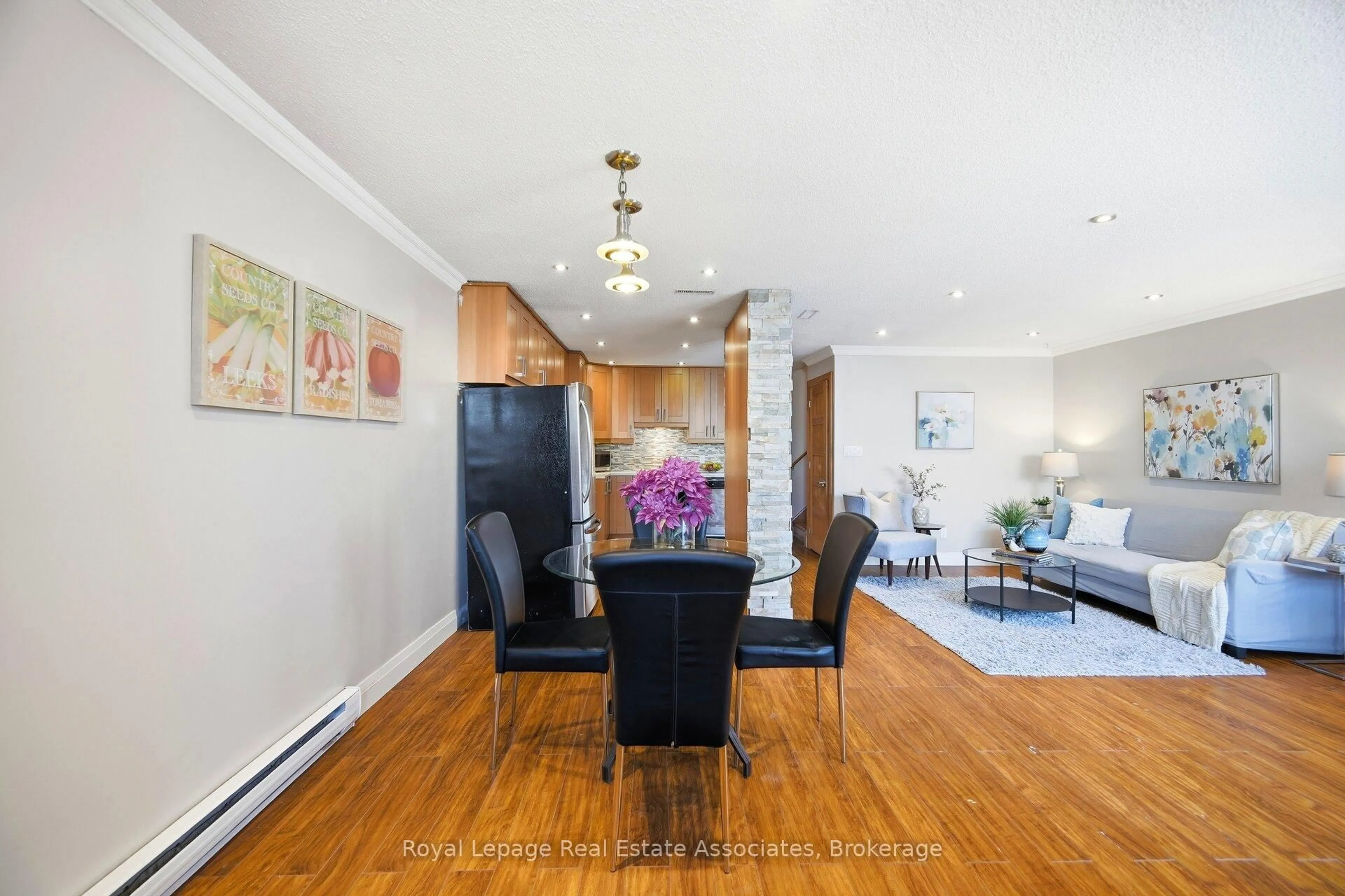 Dining room, wood/laminate floor for 1055 Dundas St #222, Mississauga Ontario L4Y 3X6