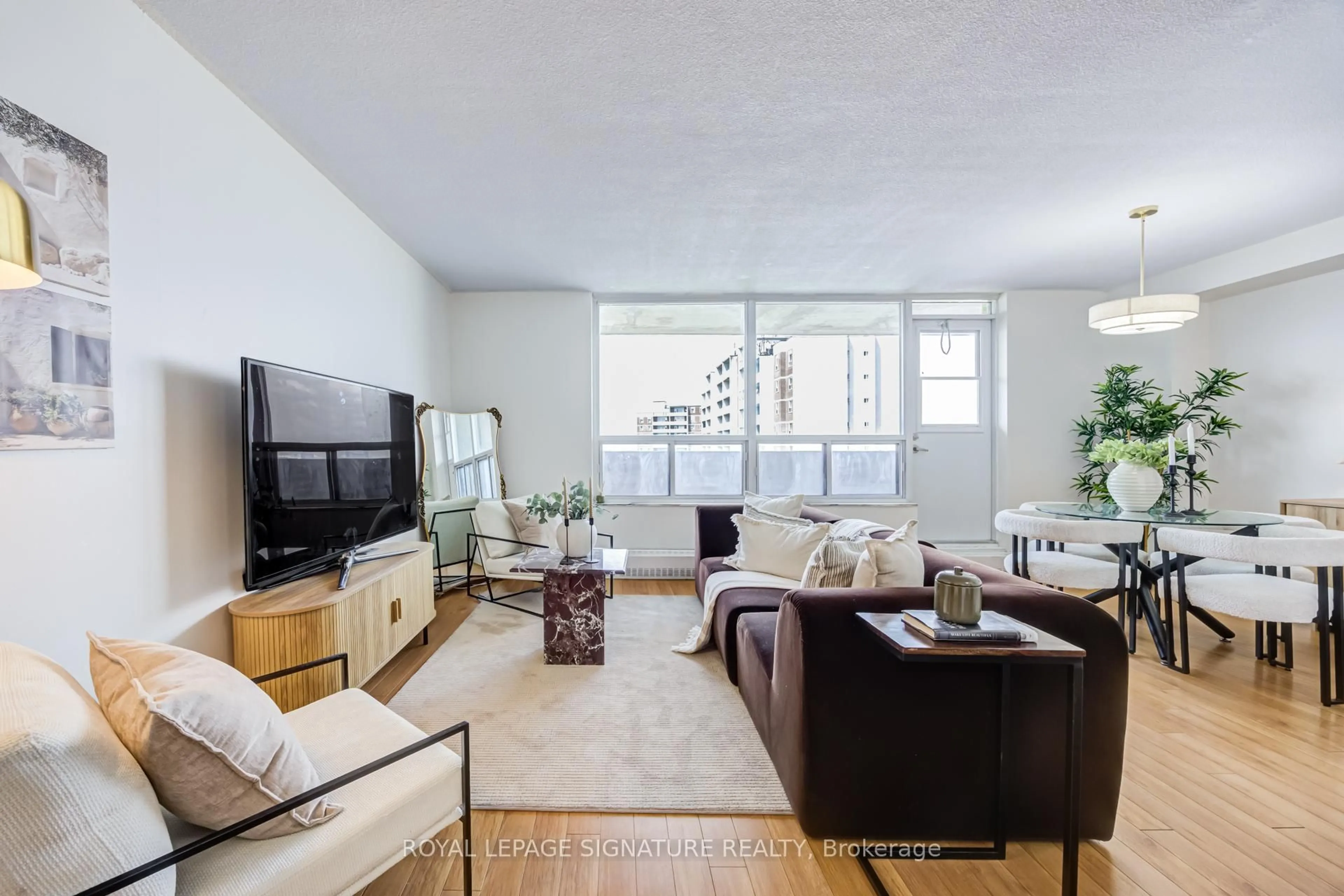 Living room with furniture, unknown for 3390 Weston Rd #2309, Toronto Ontario M9M 2X3