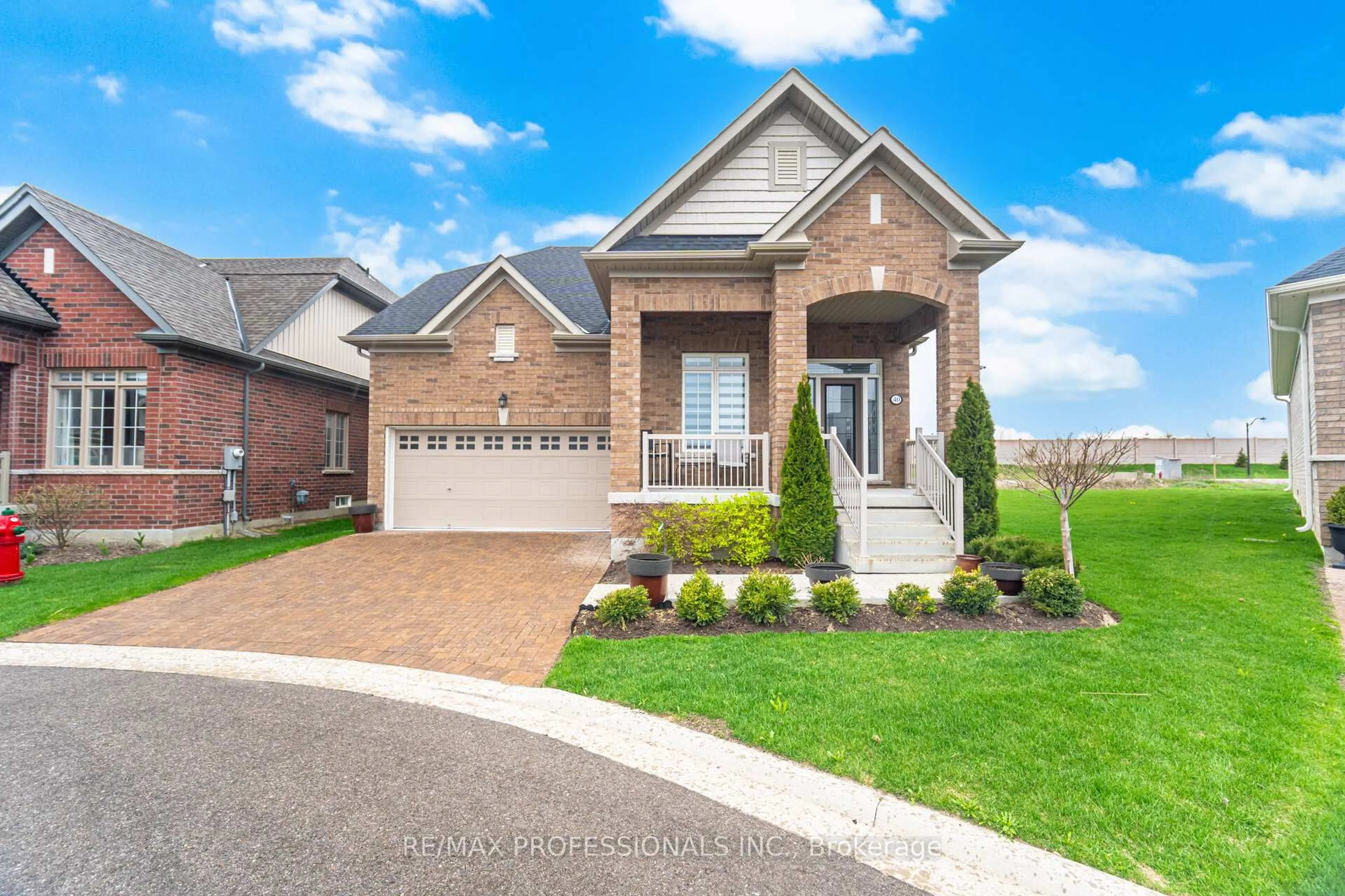Home with brick exterior material, street for 40 Bluestone Cres, Brampton Ontario L6R 4B8