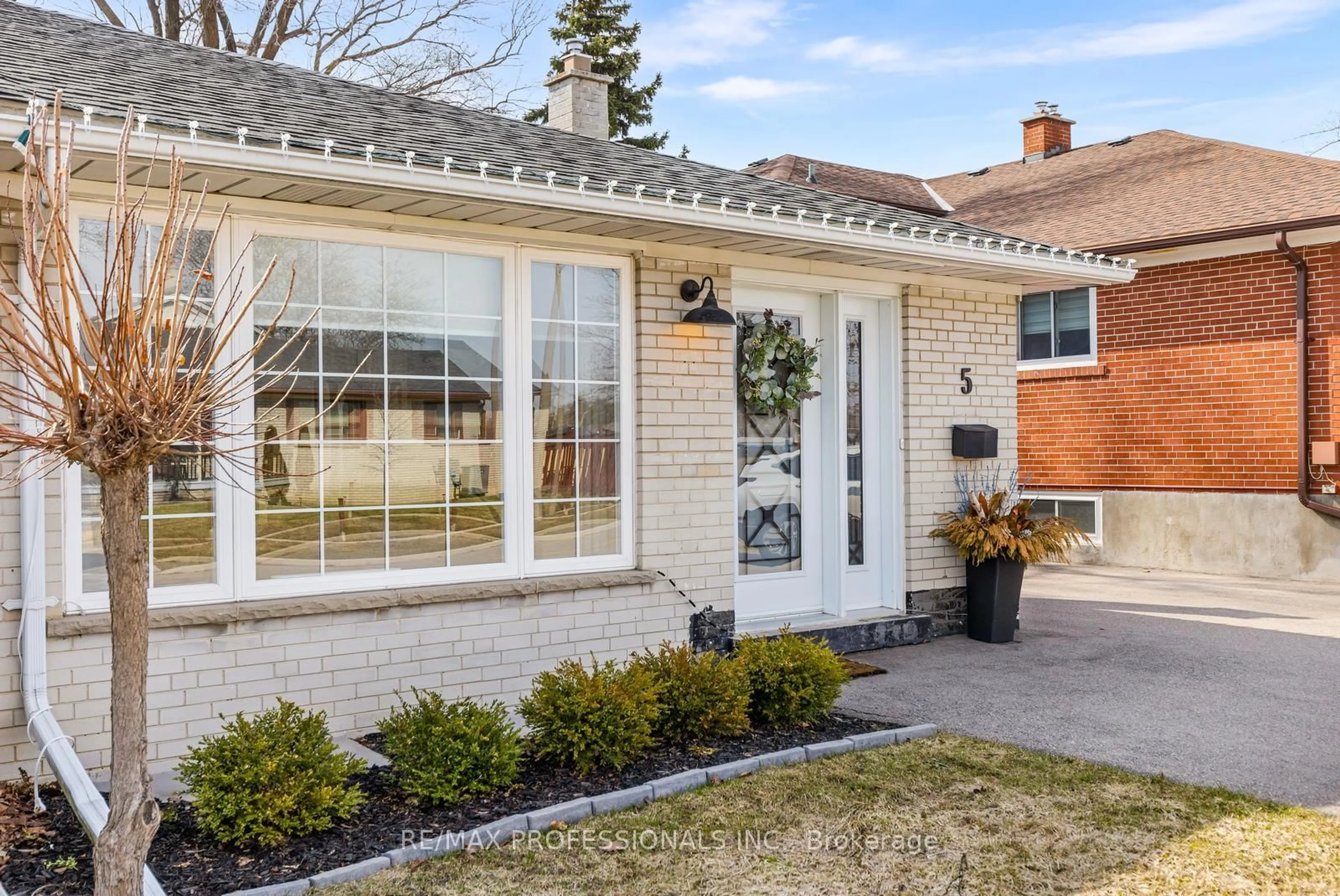 Home with brick exterior material, street for 5 Birgitta Cres, Toronto Ontario M9C 3W1