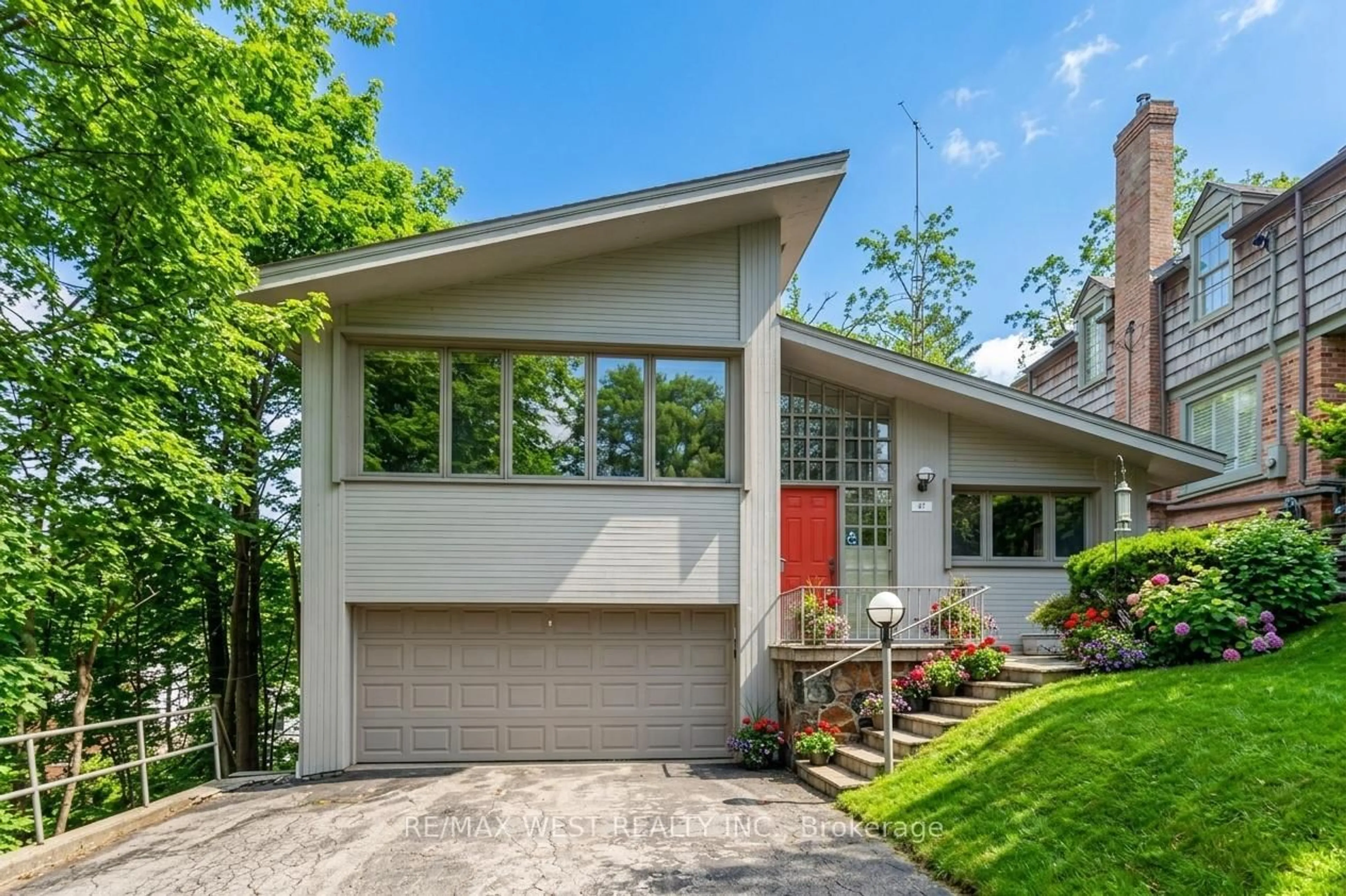 Home with vinyl exterior material, street for 47 Saint Georges Rd, Toronto Ontario M9A 3T2