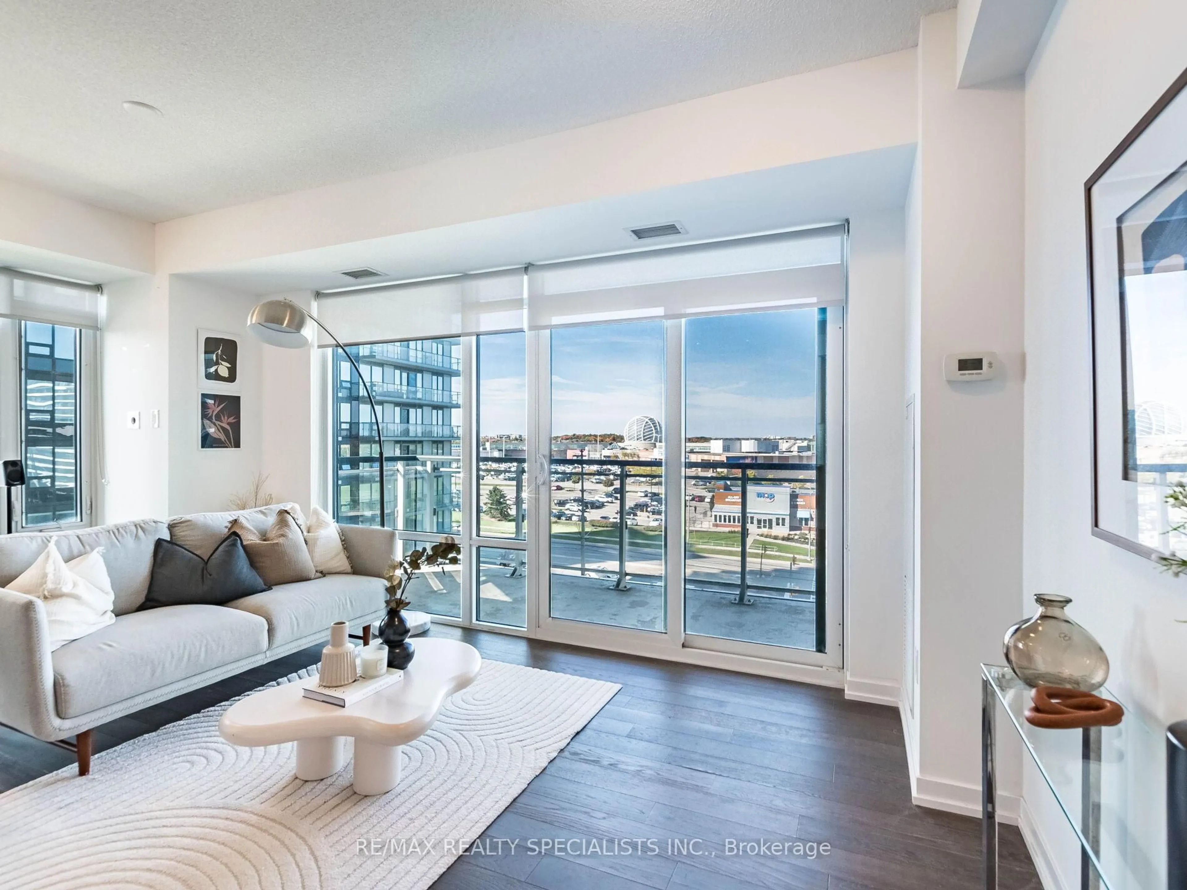 Living room with furniture, unknown for 2560 Eglinton Ave #610, Mississauga Ontario L5M 0Y3