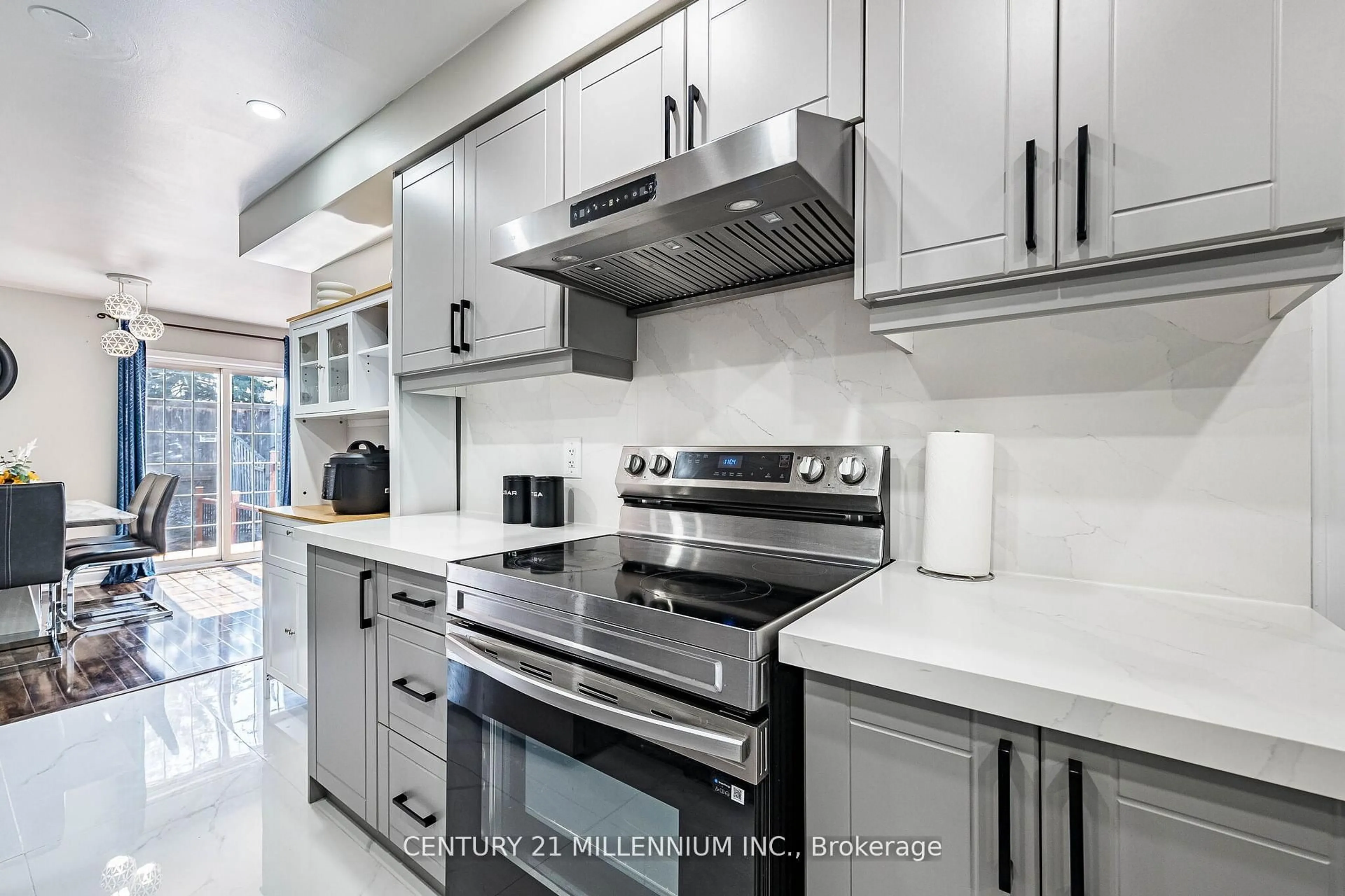 Contemporary kitchen, ceramic/tile floor for 100 Monaco Crt, Brampton Ontario L7A 1X2