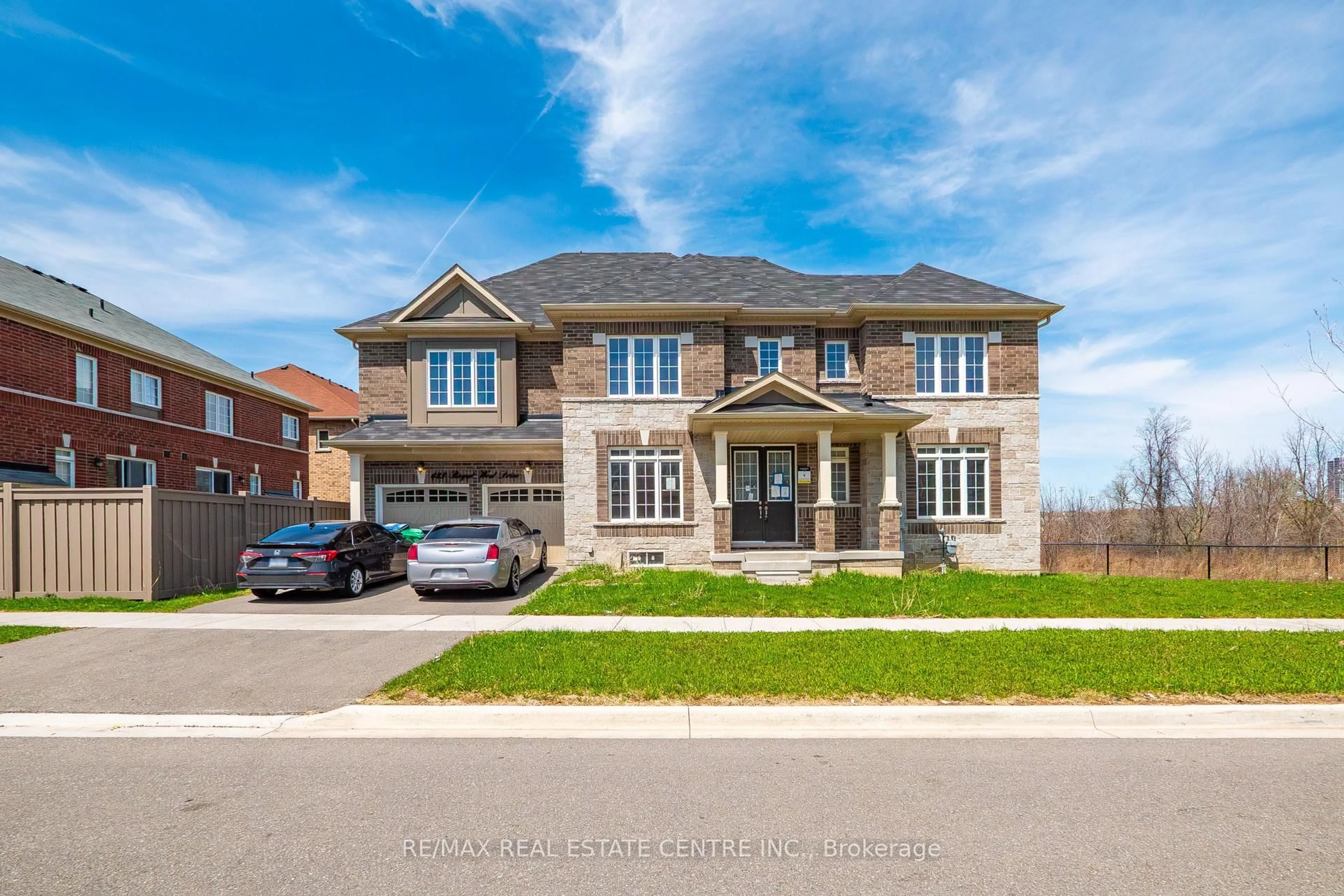 Home with brick exterior material, street for 423 Royal West Dr, Brampton Ontario L6X 5K1