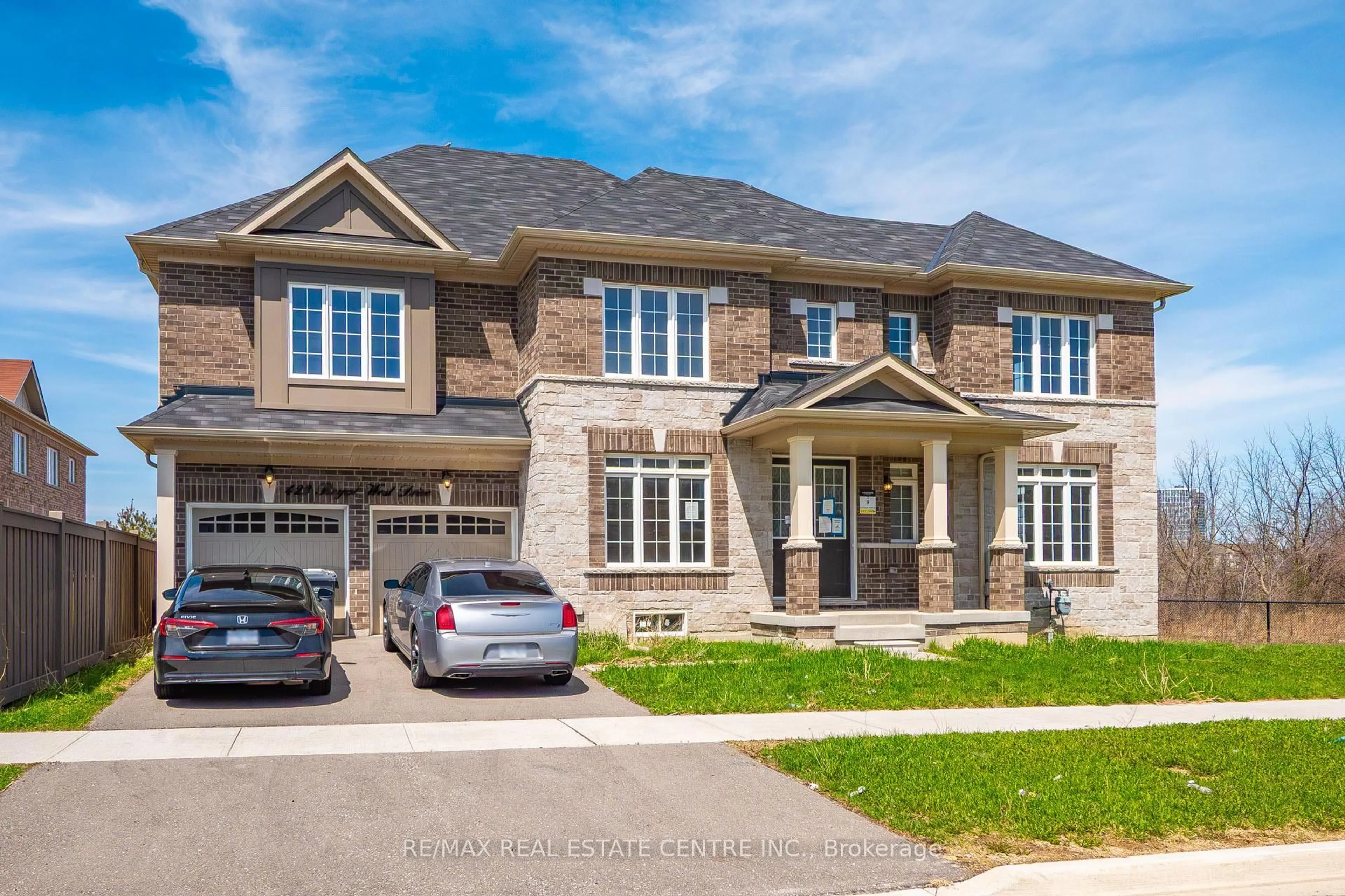 Home with brick exterior material, street for 423 Royal West Dr, Brampton Ontario L6X 5K1