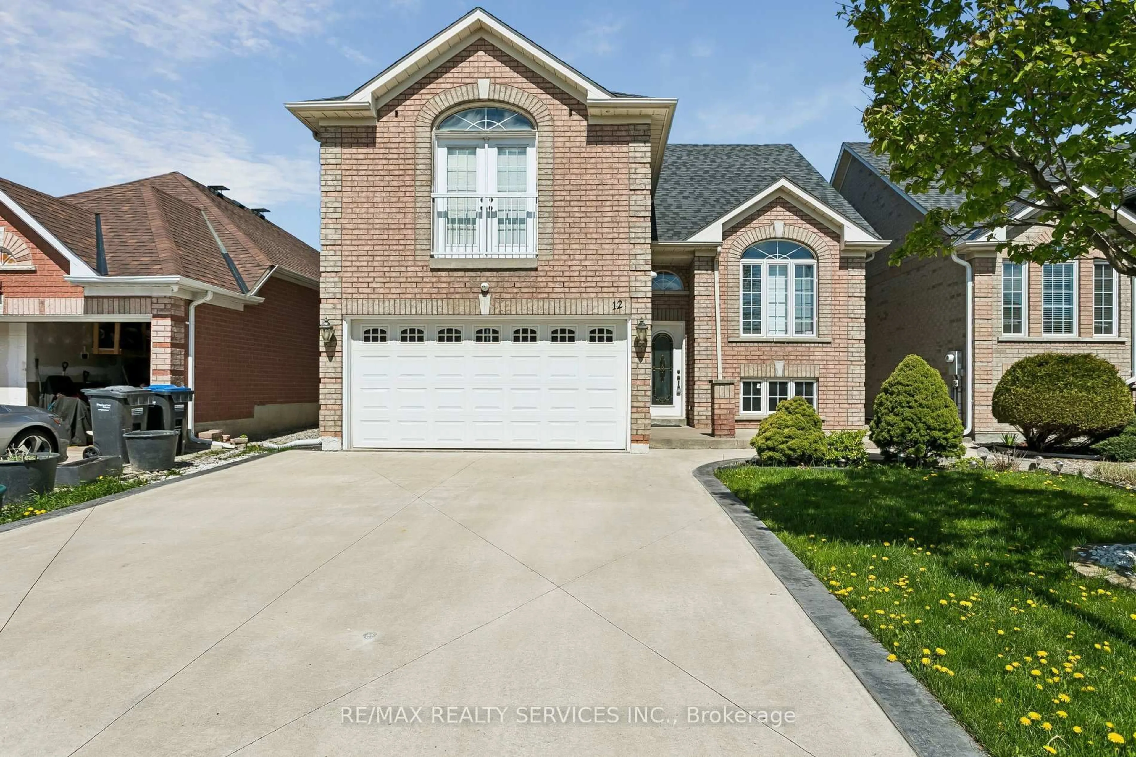 Home with brick exterior material, street for 12 Goldie Ave, Brampton Ontario L7A 2C8