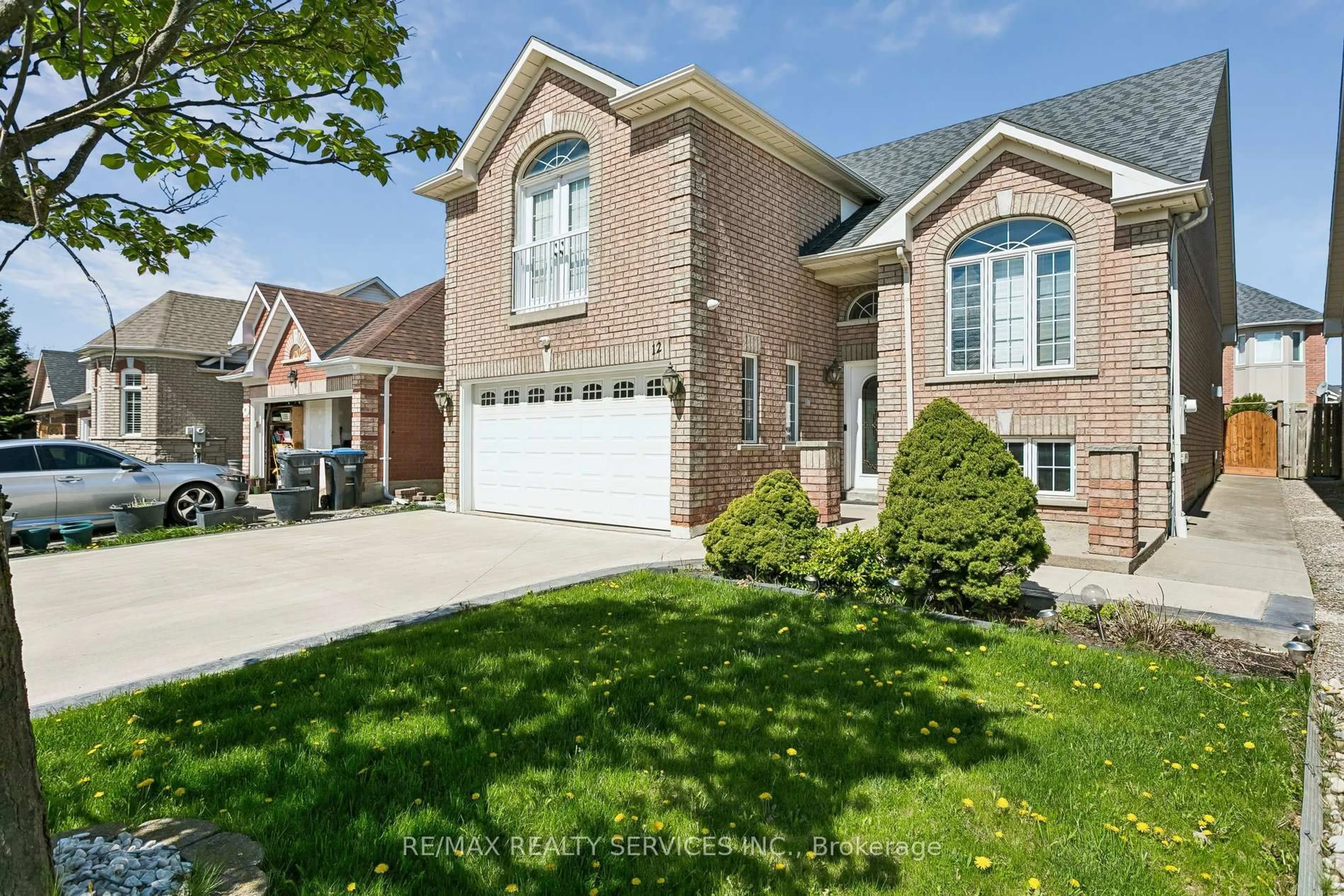 Home with brick exterior material, street for 12 Goldie Ave, Brampton Ontario L7A 2C8