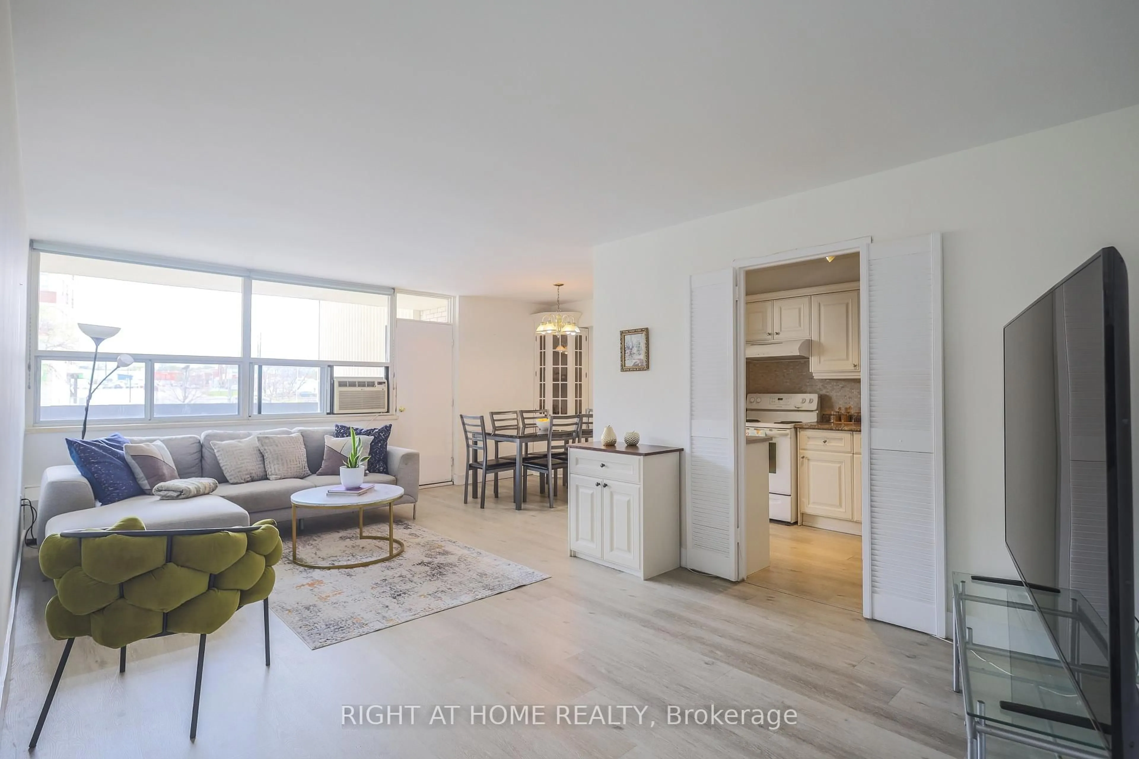 Living room with furniture, unknown for 1455 Lawrence Ave #207, Toronto Ontario M6L 1B1