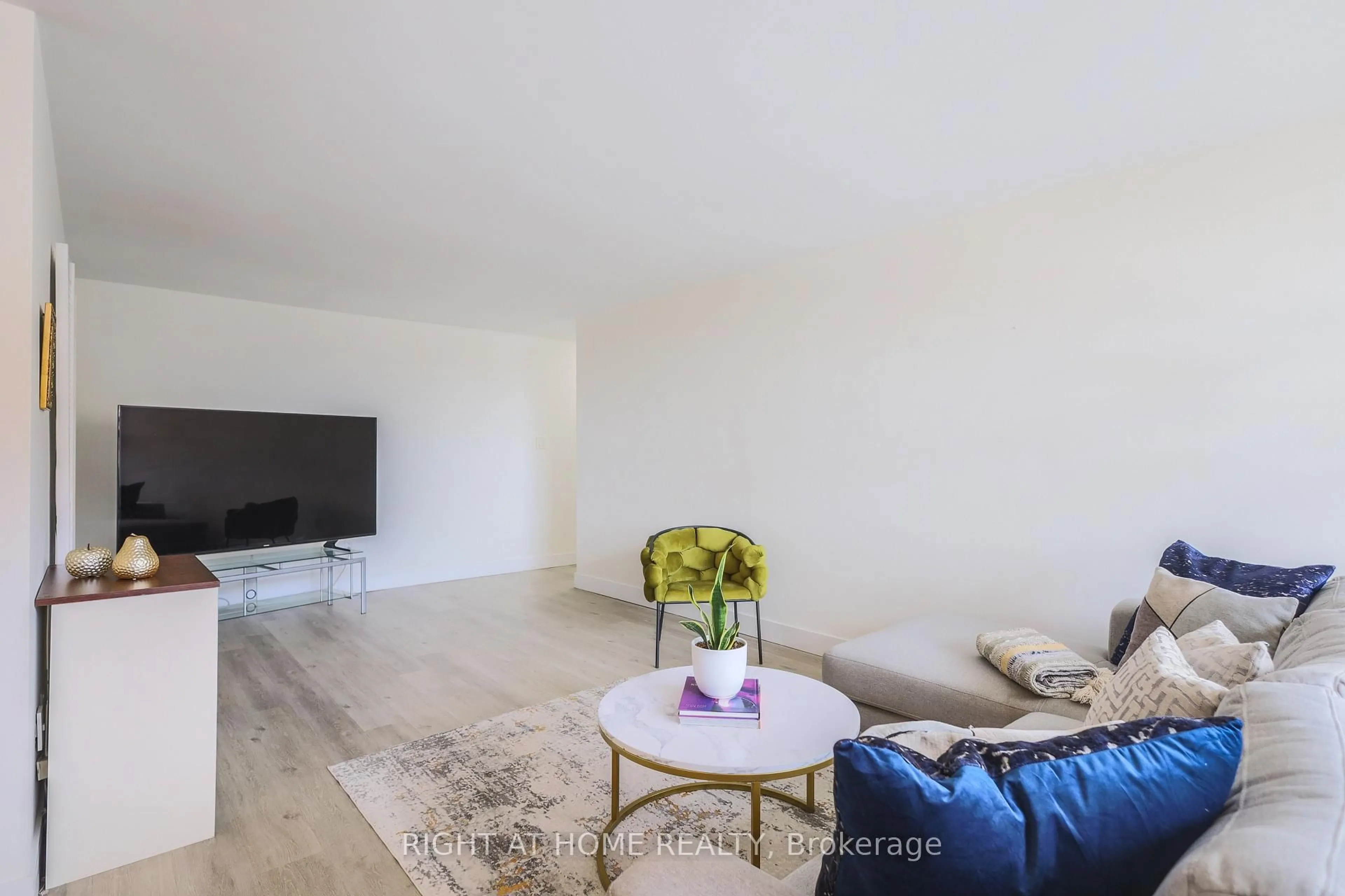 Living room with furniture, unknown for 1455 Lawrence Ave #207, Toronto Ontario M6L 1B1