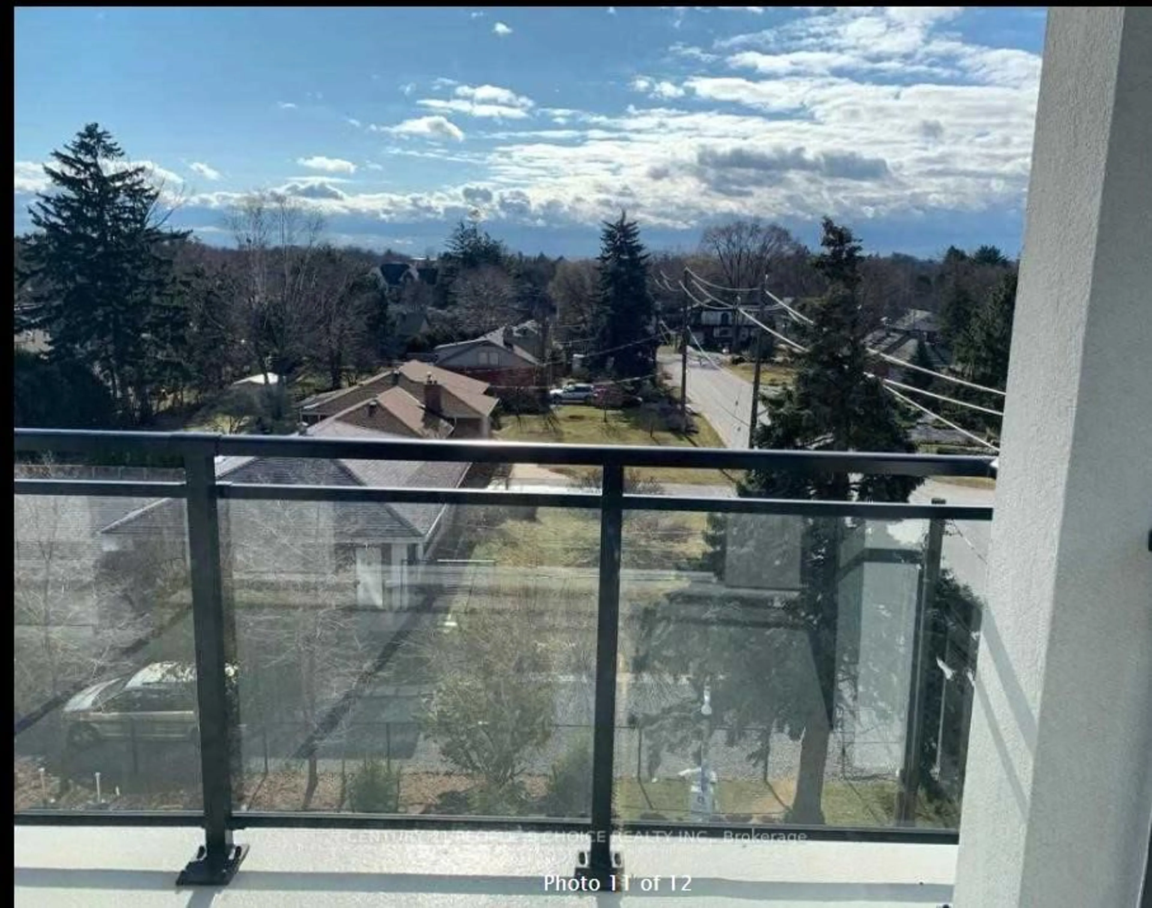 Balcony in the apartment, city buildings view from balcony for 320 Plains Rd #406, Burlington Ontario L7T 0C1
