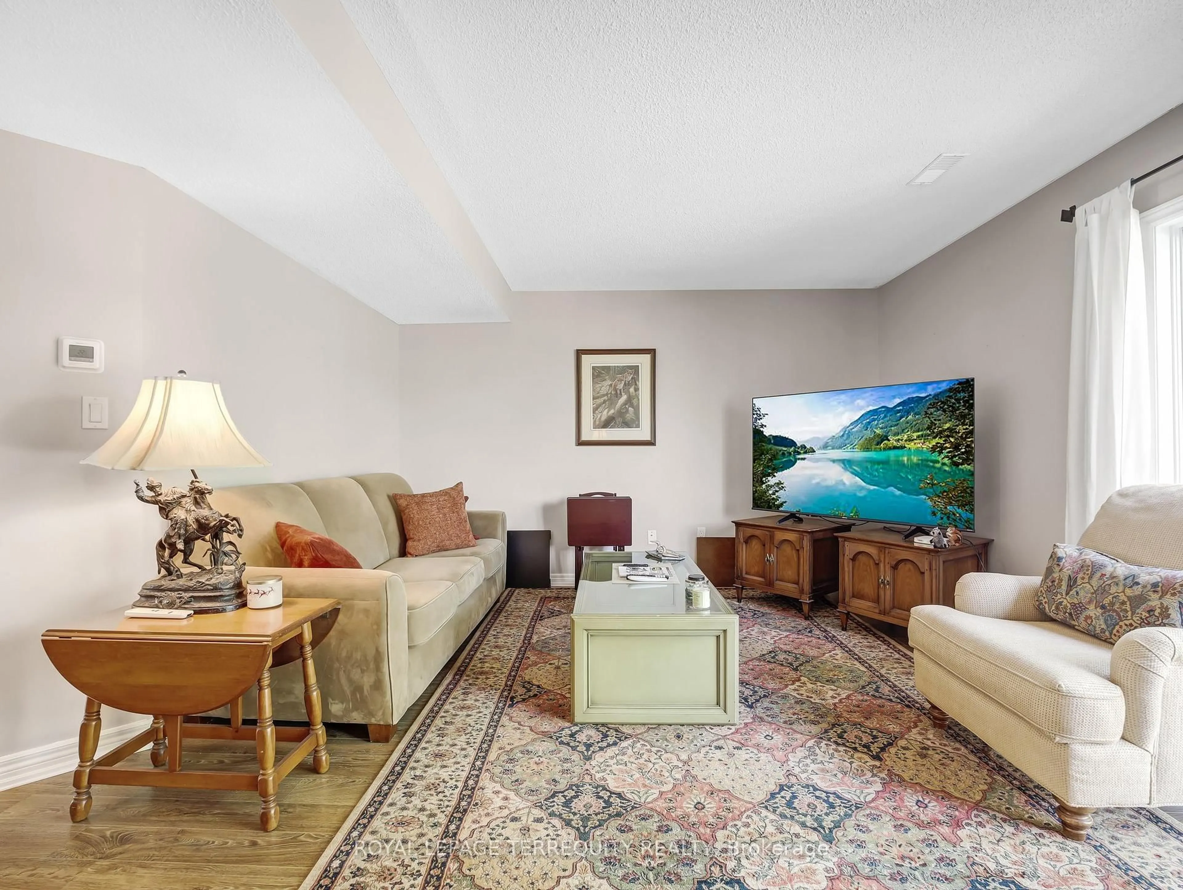 Living room with furniture, unknown for 4045 Upper Middle Rd #51, Burlington Ontario L7M 4S9