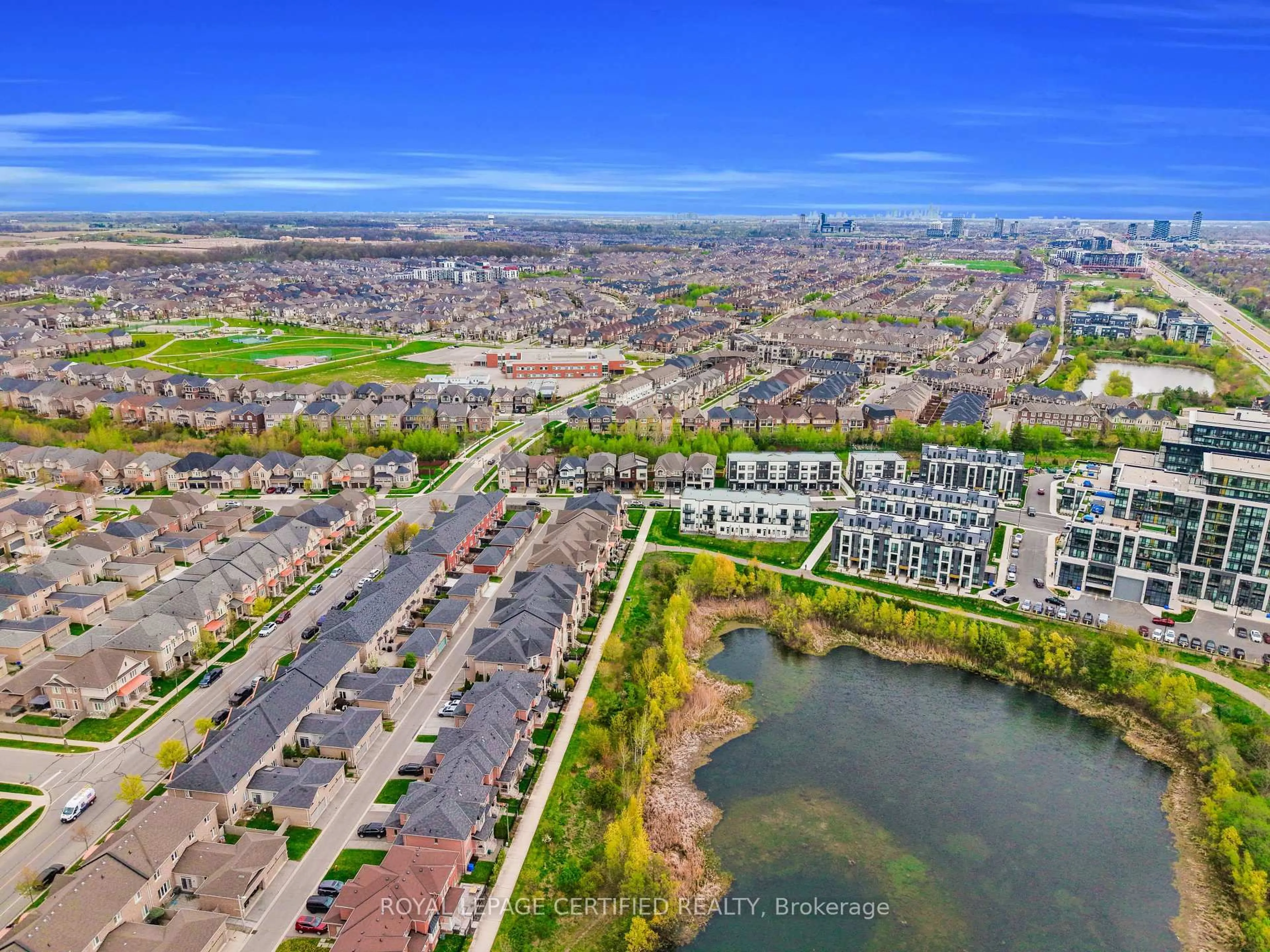 A pic from outside/outdoor area/front of a property/back of a property/a pic from drone, water/lake/river/ocean view for 3071 Trailside Dr, Oakville Ontario L6M 0Z4