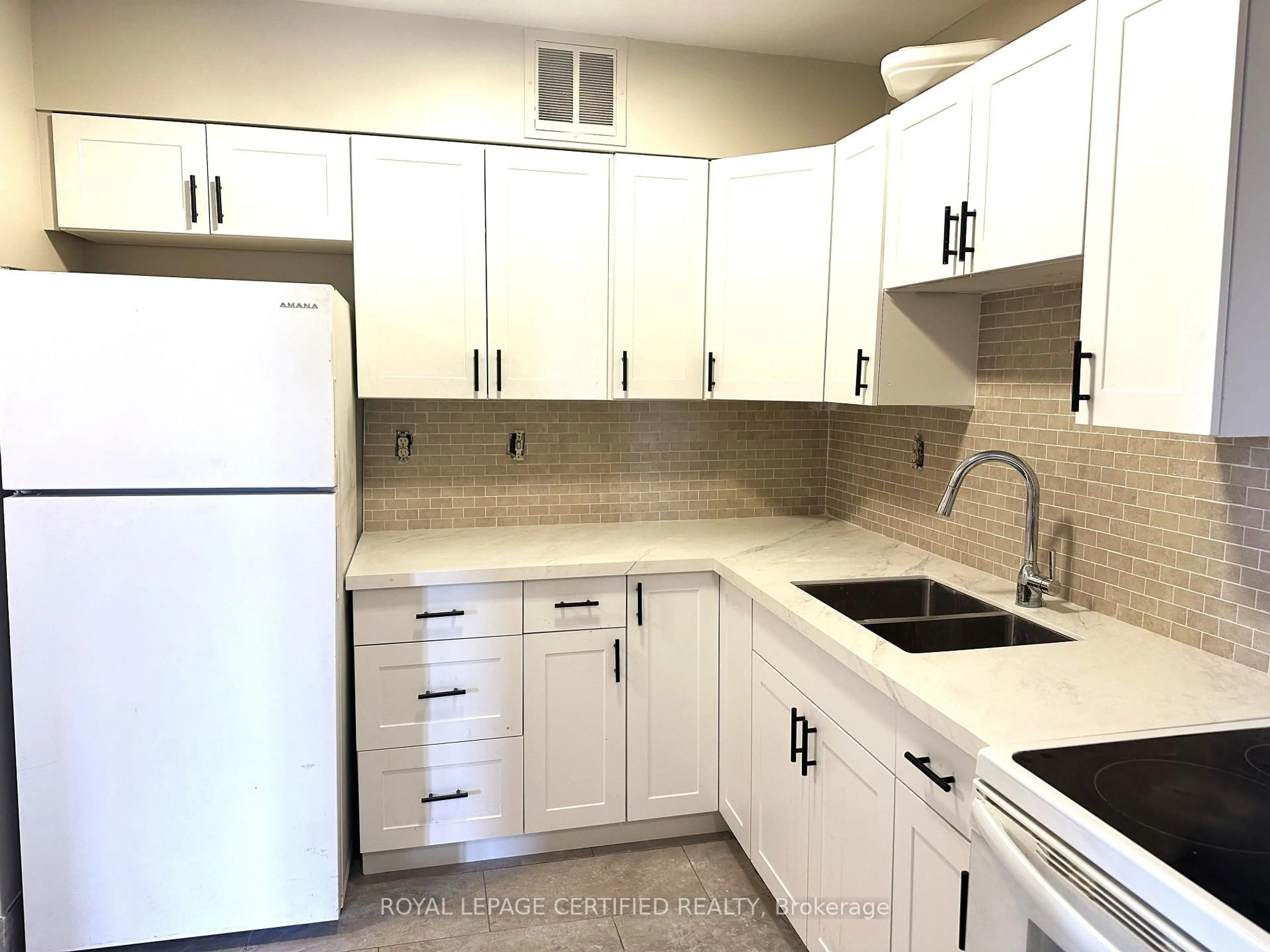 Standard kitchen, unknown for 380 Dixon Rd #208, Toronto Ontario M9R 1T3