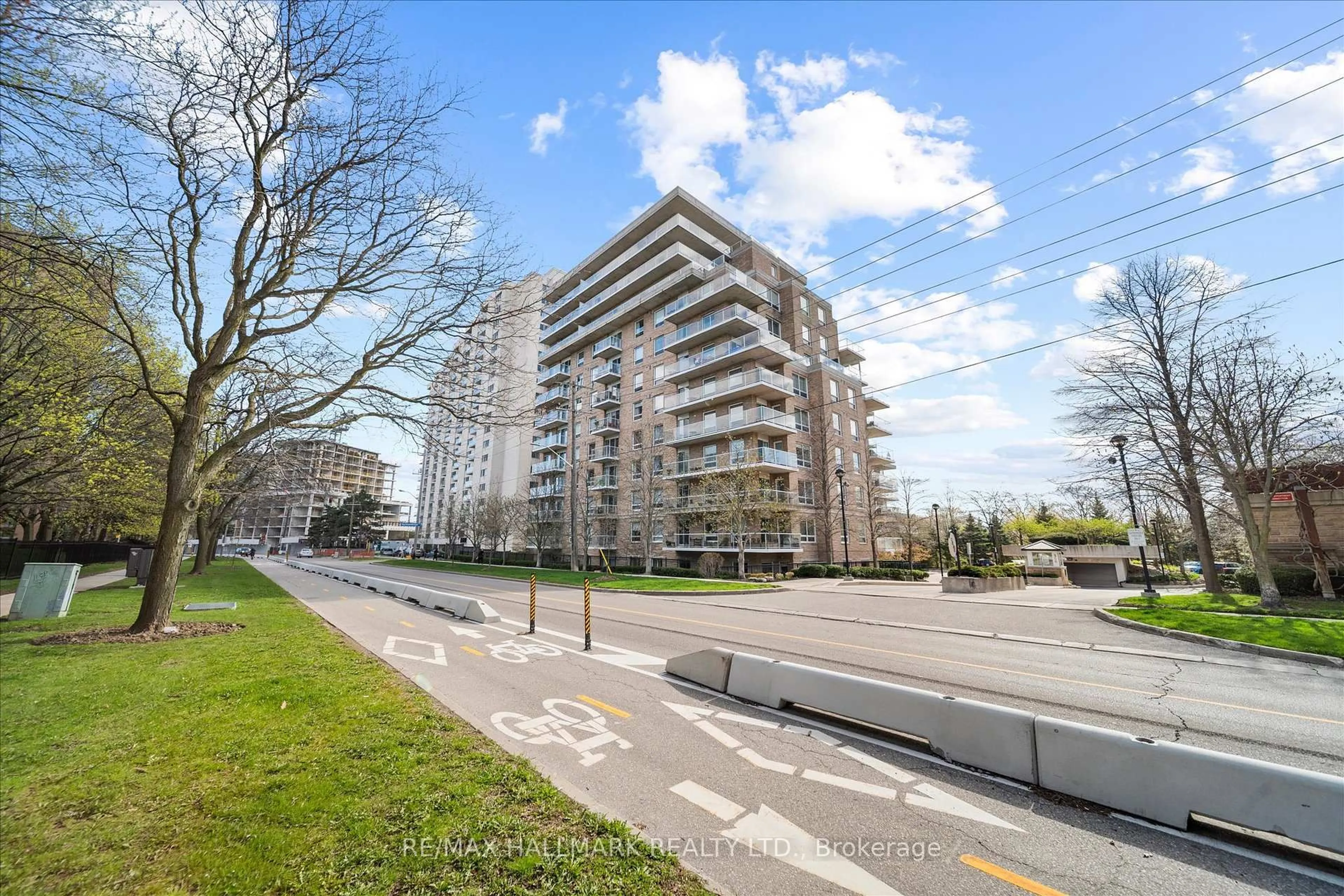 A pic from outside/outdoor area/front of a property/back of a property/a pic from drone, street for 350 Mill Rd #611, Toronto Ontario M9C 5R7