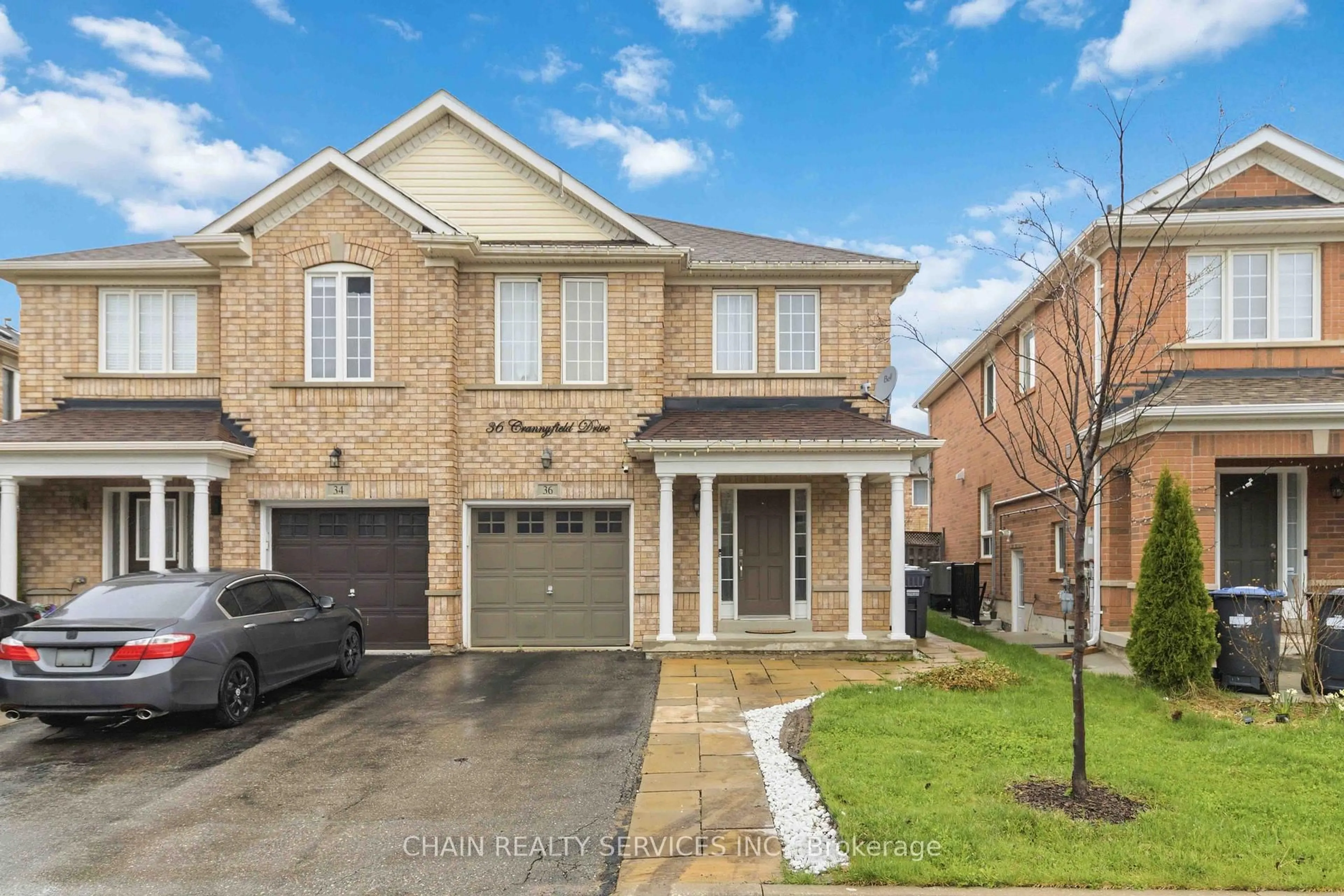 Home with brick exterior material, street for 36 Crannyfield Dr, Brampton Ontario L7A 3X2