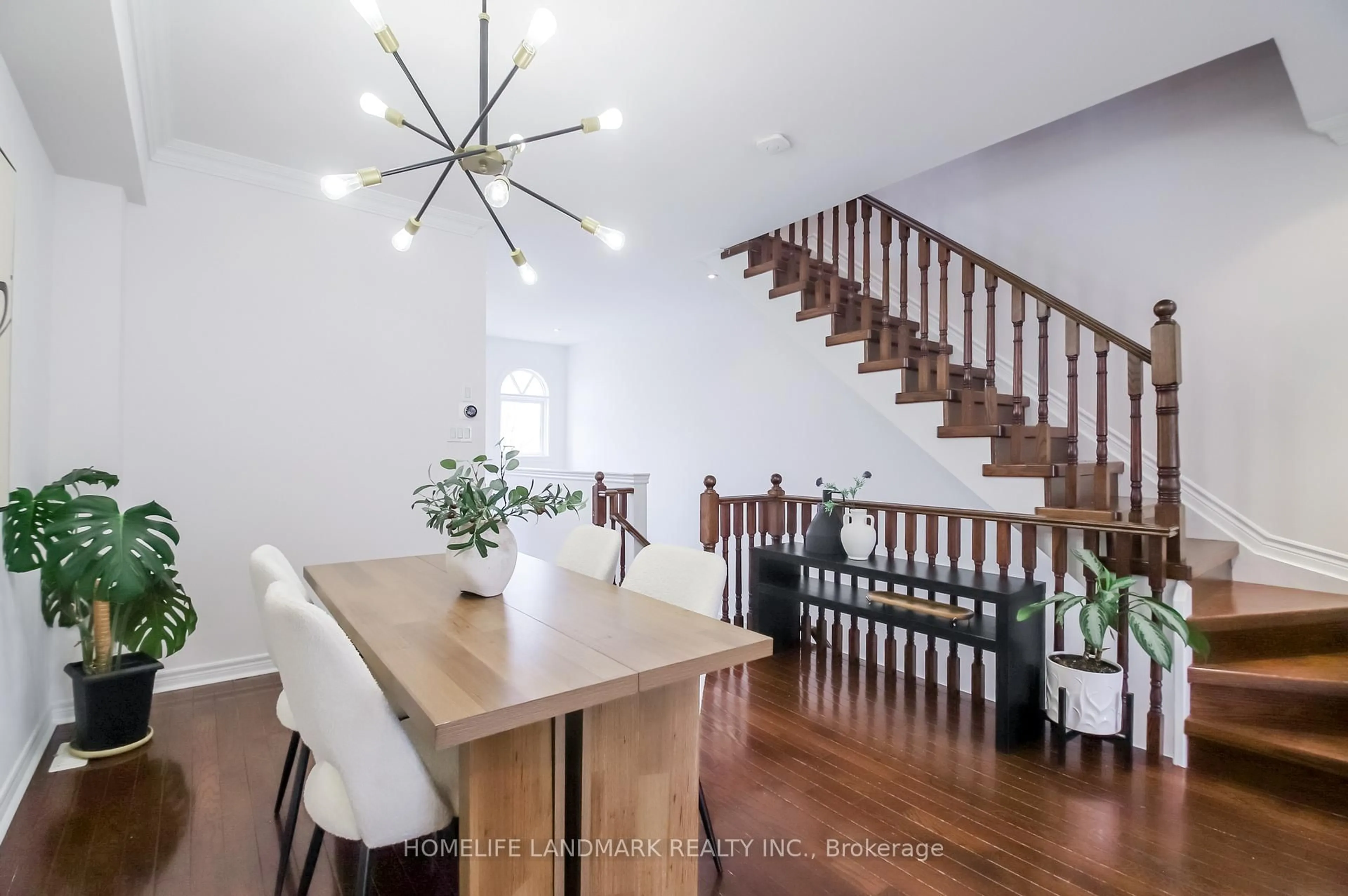 Dining room, wood/laminate floor for 34 Mendota Rd #9, Toronto Ontario M8Y 1E8