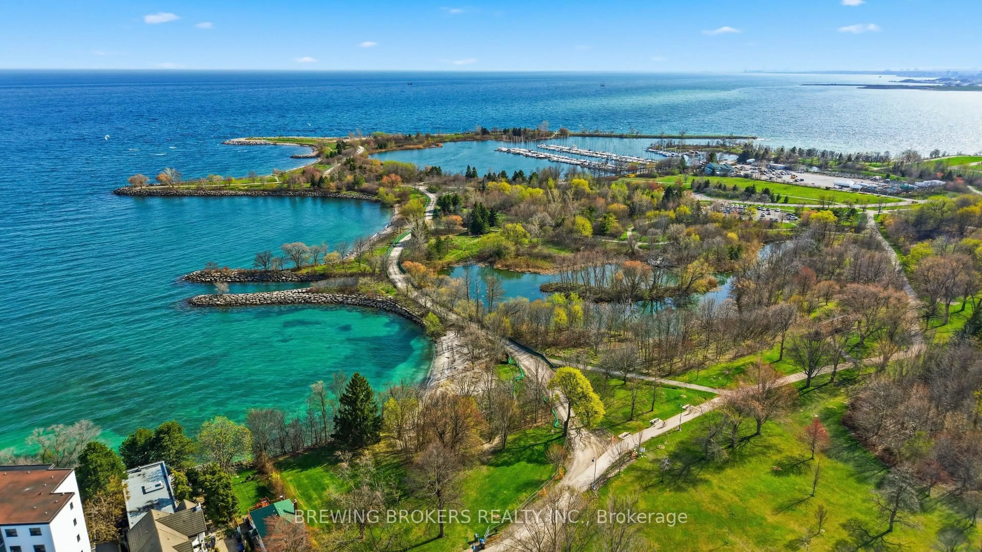 A pic from outside/outdoor area/front of a property/back of a property/a pic from drone, water/lake/river/ocean view for 72 Thirteenth St, Toronto Ontario M8V 3H6