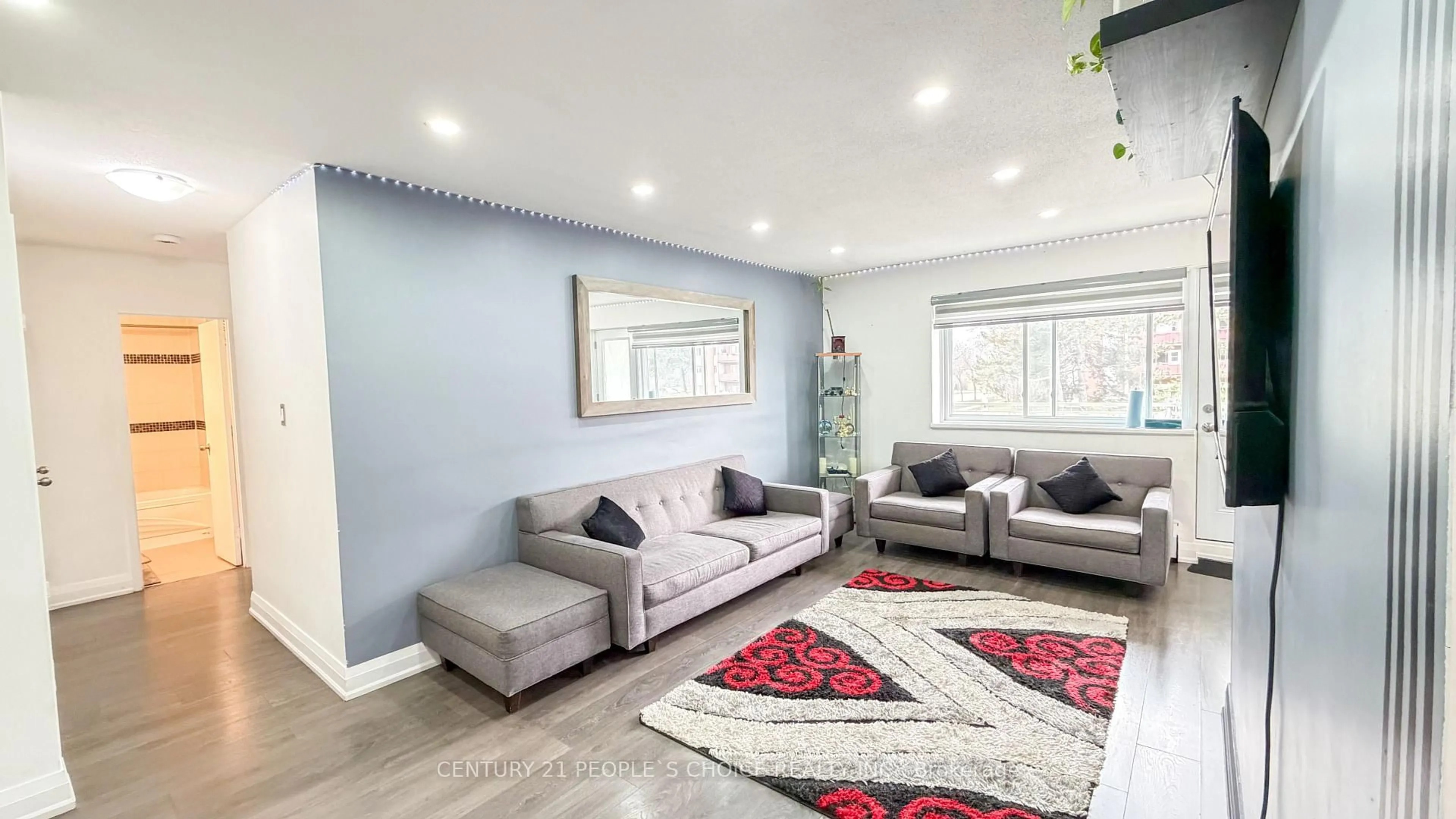 Living room with furniture, unknown for 2485 Woking Cres #201, Mississauga Ontario L5K 1Z6