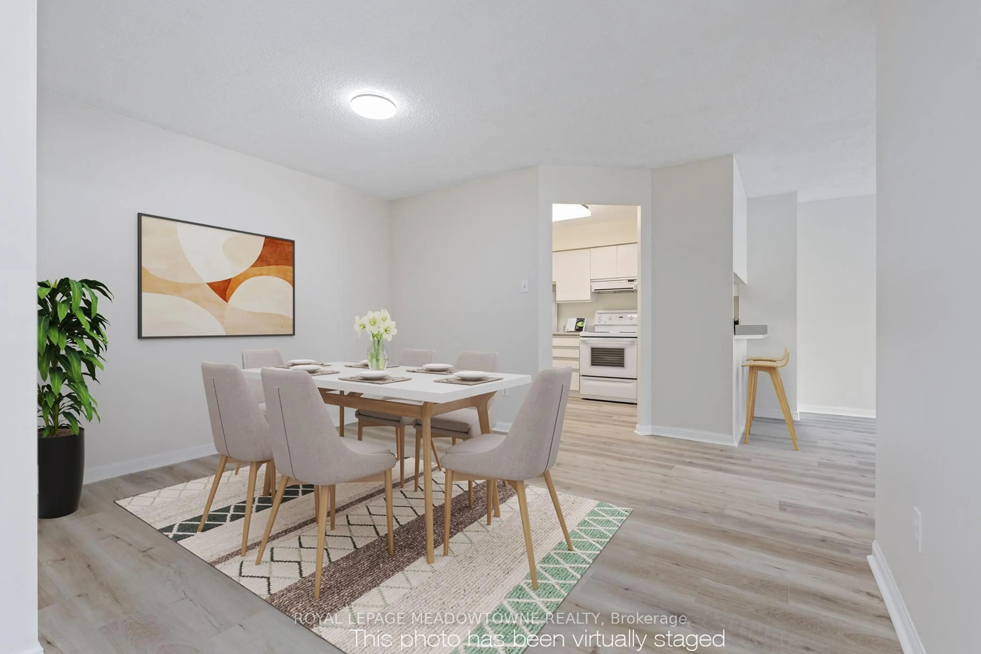 Dining room, wood/laminate floor for 10 Laurelcrest St #104, Brampton Ontario L6S 5Y3