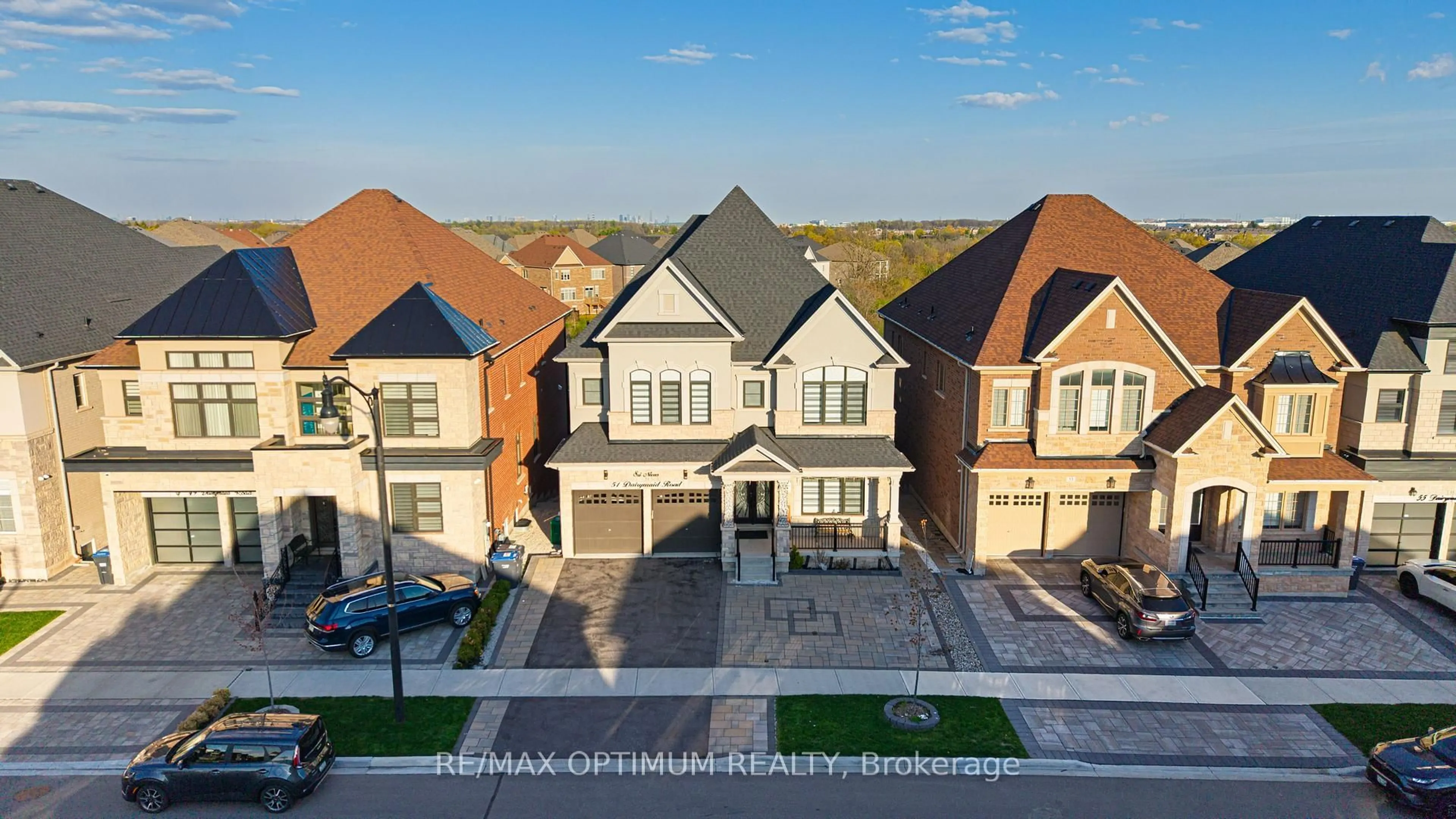 A pic from outside/outdoor area/front of a property/back of a property/a pic from drone, street for 51 Dairymaid Rd, Brampton Ontario L6X 5R9