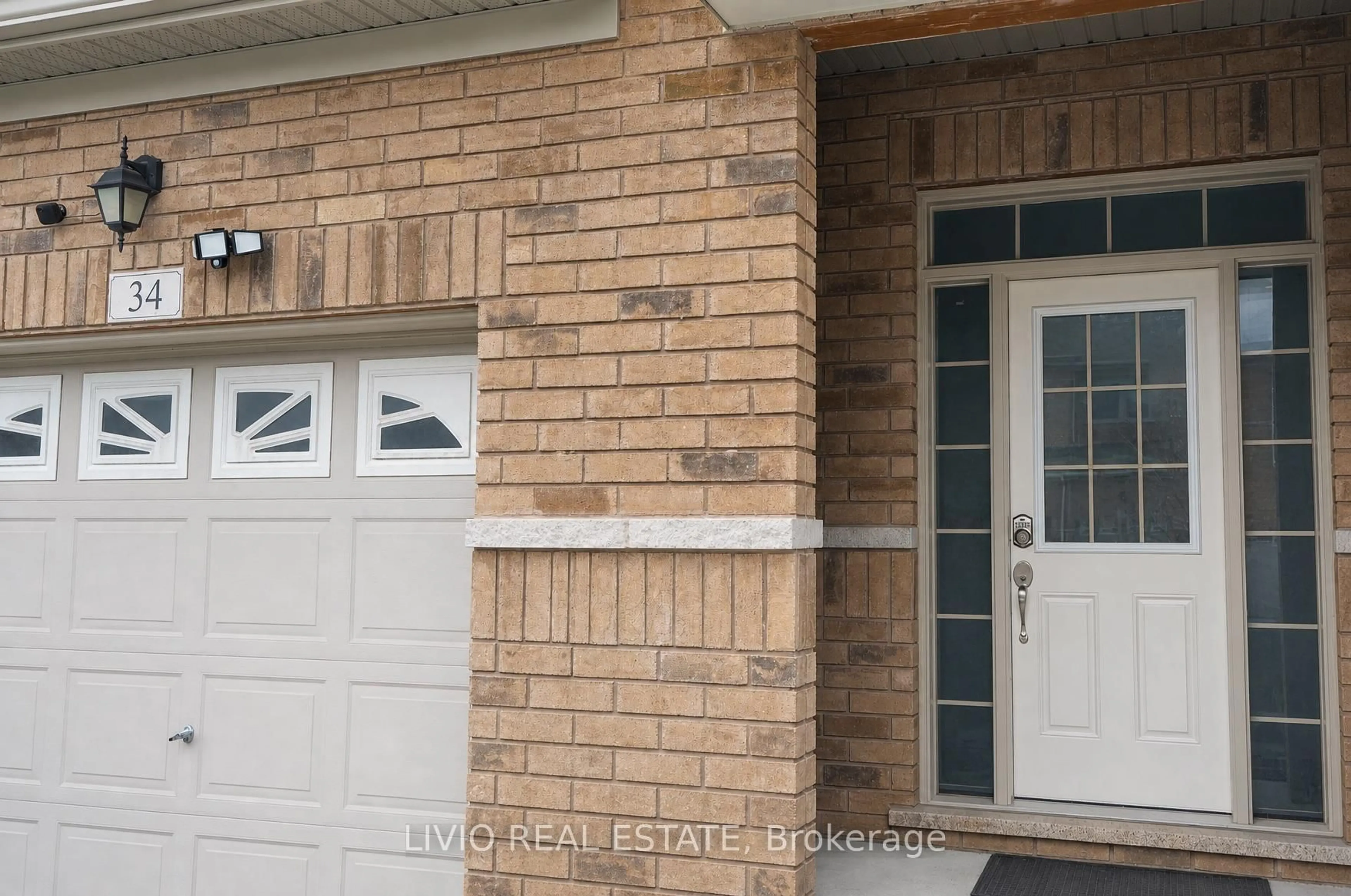 Home with brick exterior material, street for 34 Davenfield Circ, Brampton Ontario L6P 4M2