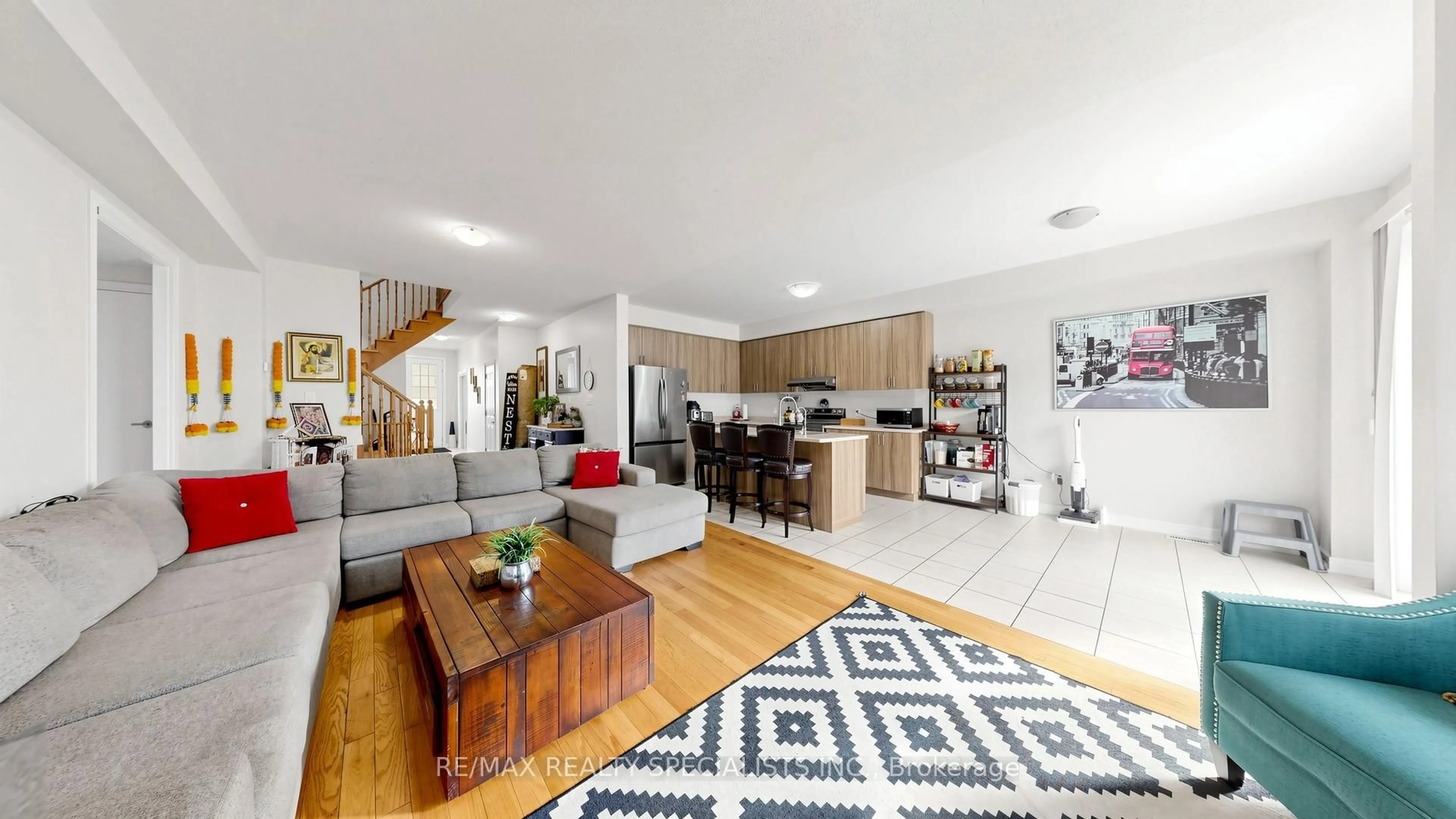Living room with furniture, wood/laminate floor for 13 Vezna Cres, Brampton Ontario L6X 5K4