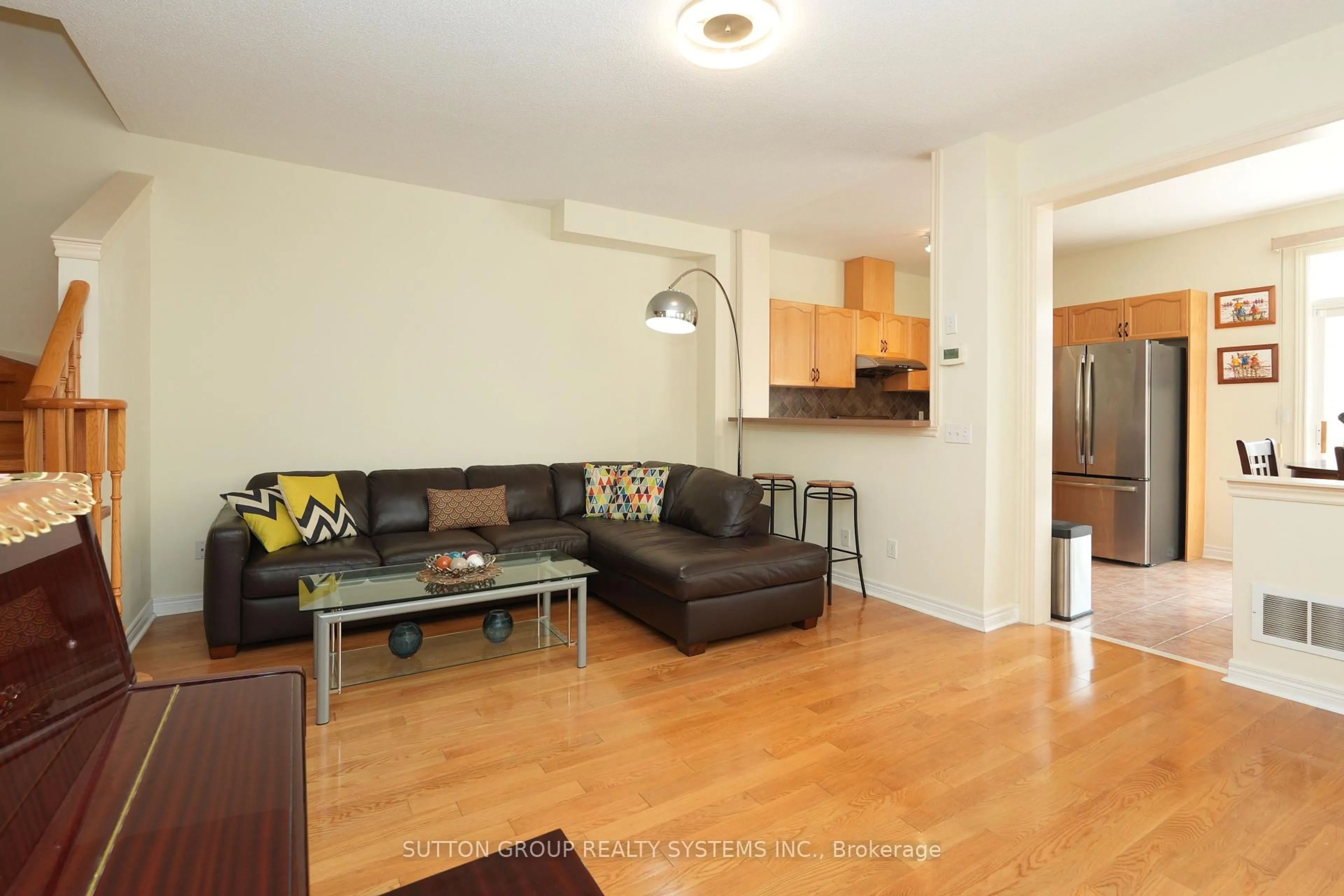 Living room with furniture, wood/laminate floor for 5636 Raleigh St, Mississauga Ontario L5M 7E4