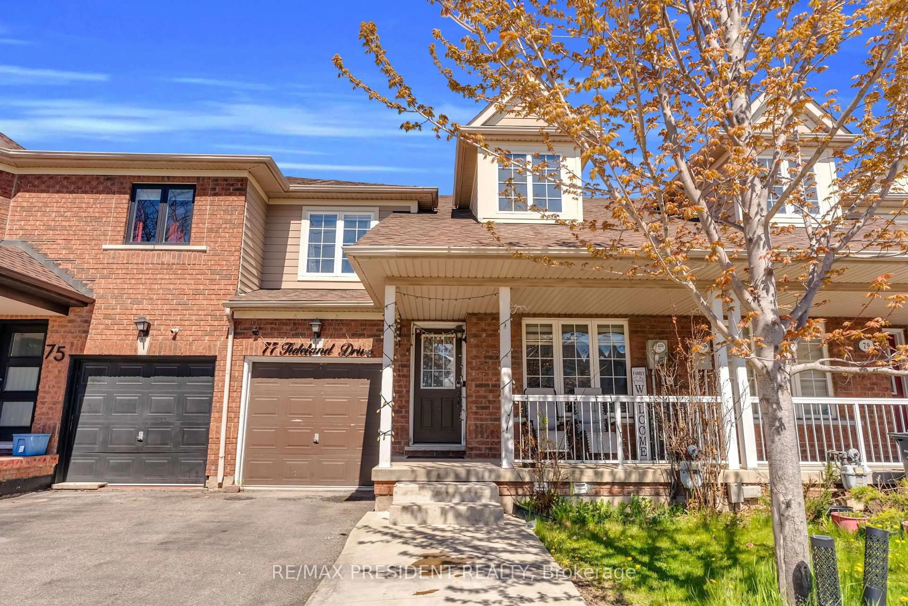 Home with brick exterior material, street for 77 Tideland Dr, Brampton Ontario L7A 2V8