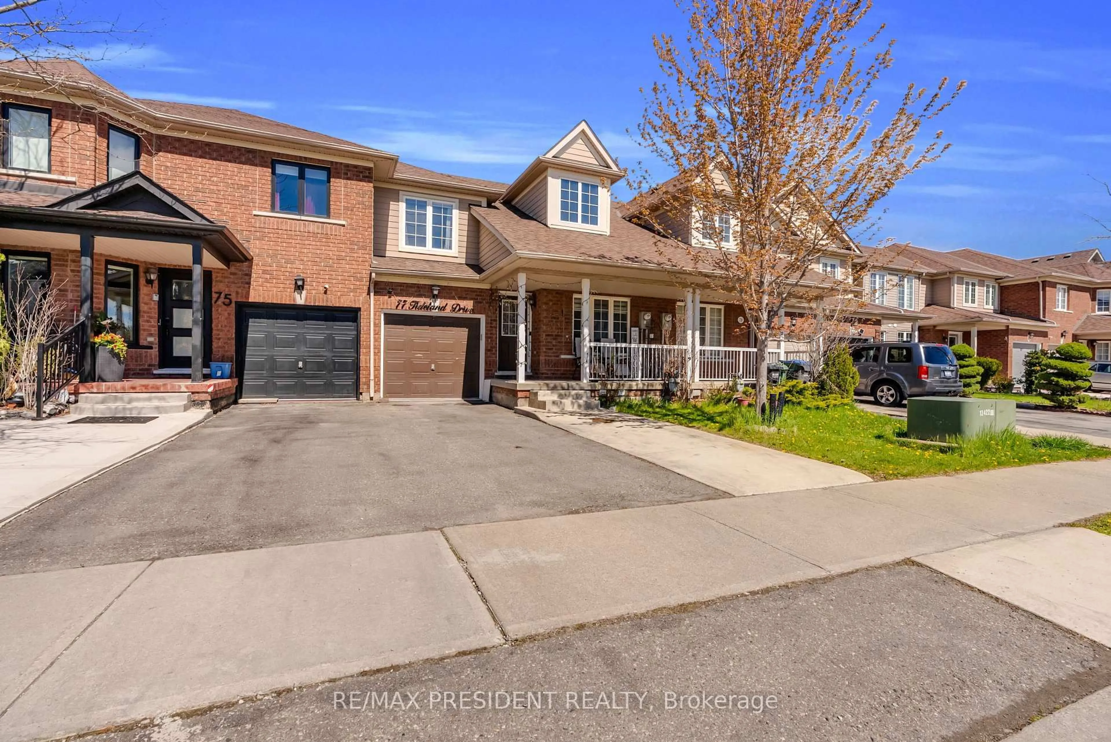 Home with brick exterior material, street for 77 Tideland Dr, Brampton Ontario L7A 2V8