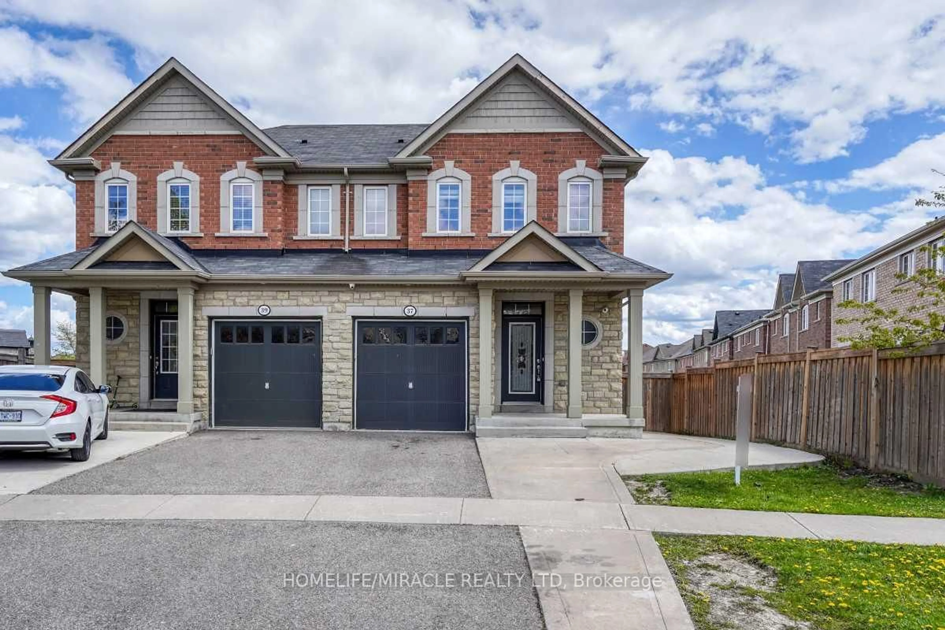 Home with brick exterior material, street for 37 Sussexvale Dr, Brampton Ontario L6R 3R5