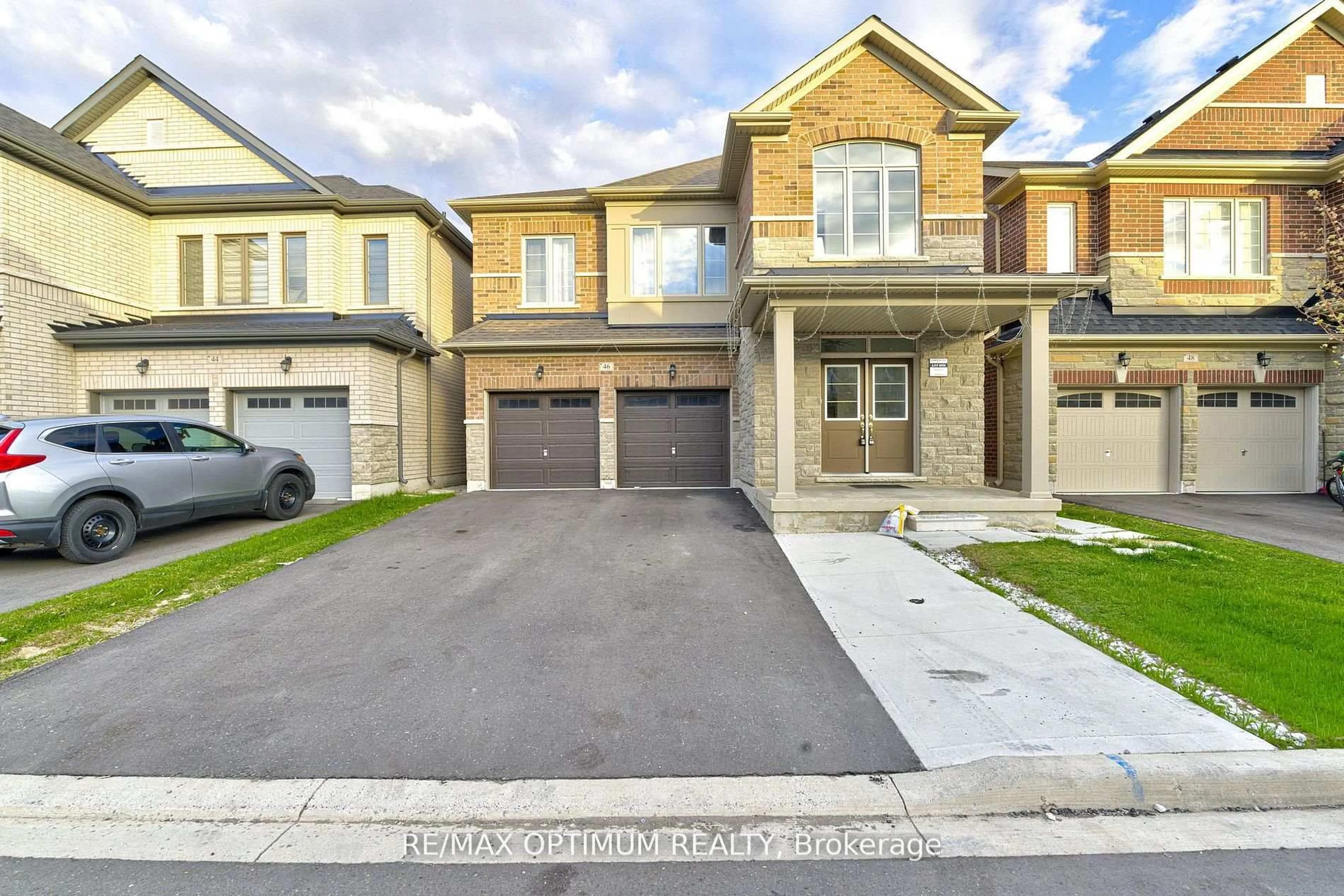 Home with brick exterior material, street for 46 Eastman Dr, Brampton Ontario L6X 5S5