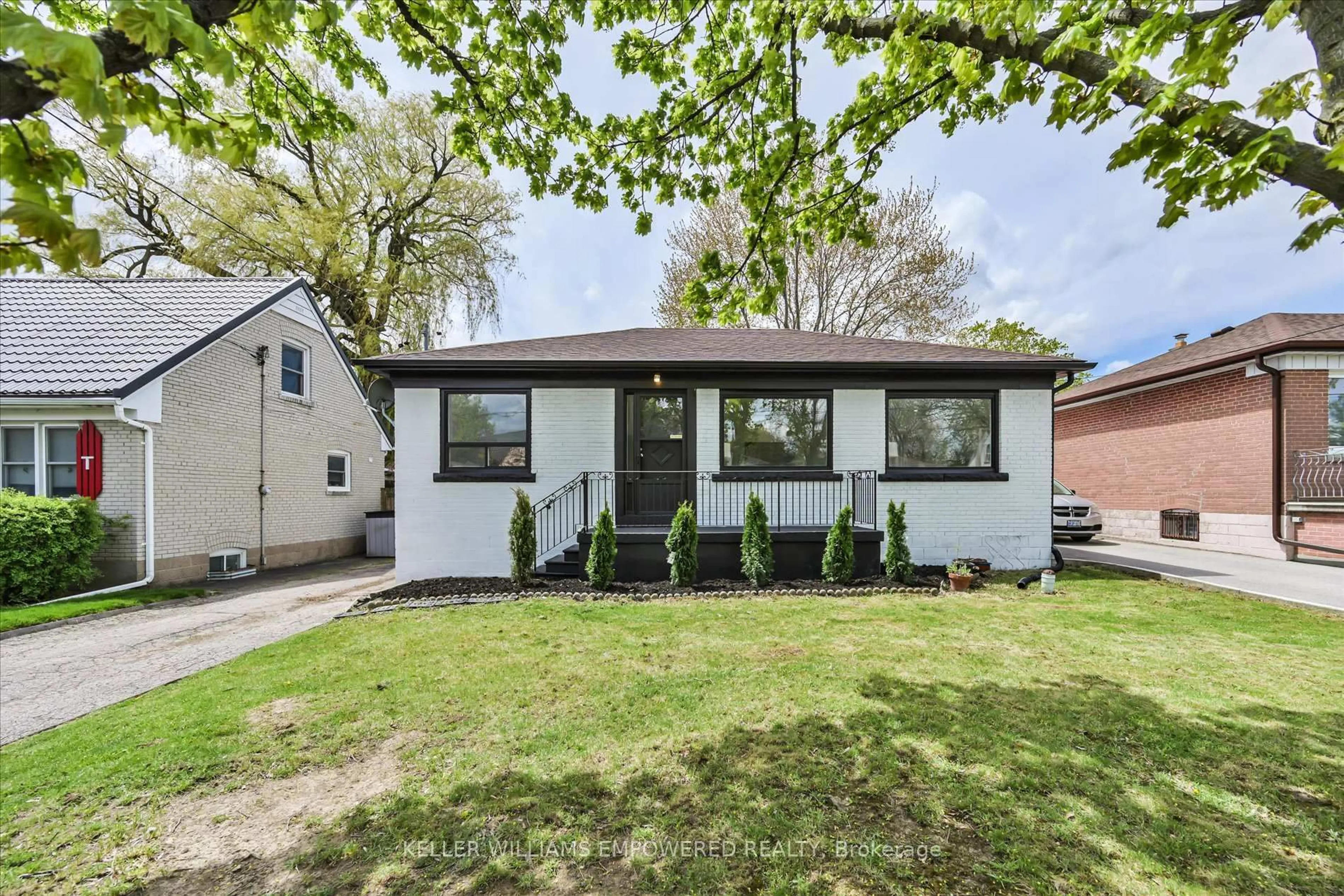 Home with vinyl exterior material, street for 42 Deerhurst Ave, Toronto Ontario M9N 3A7