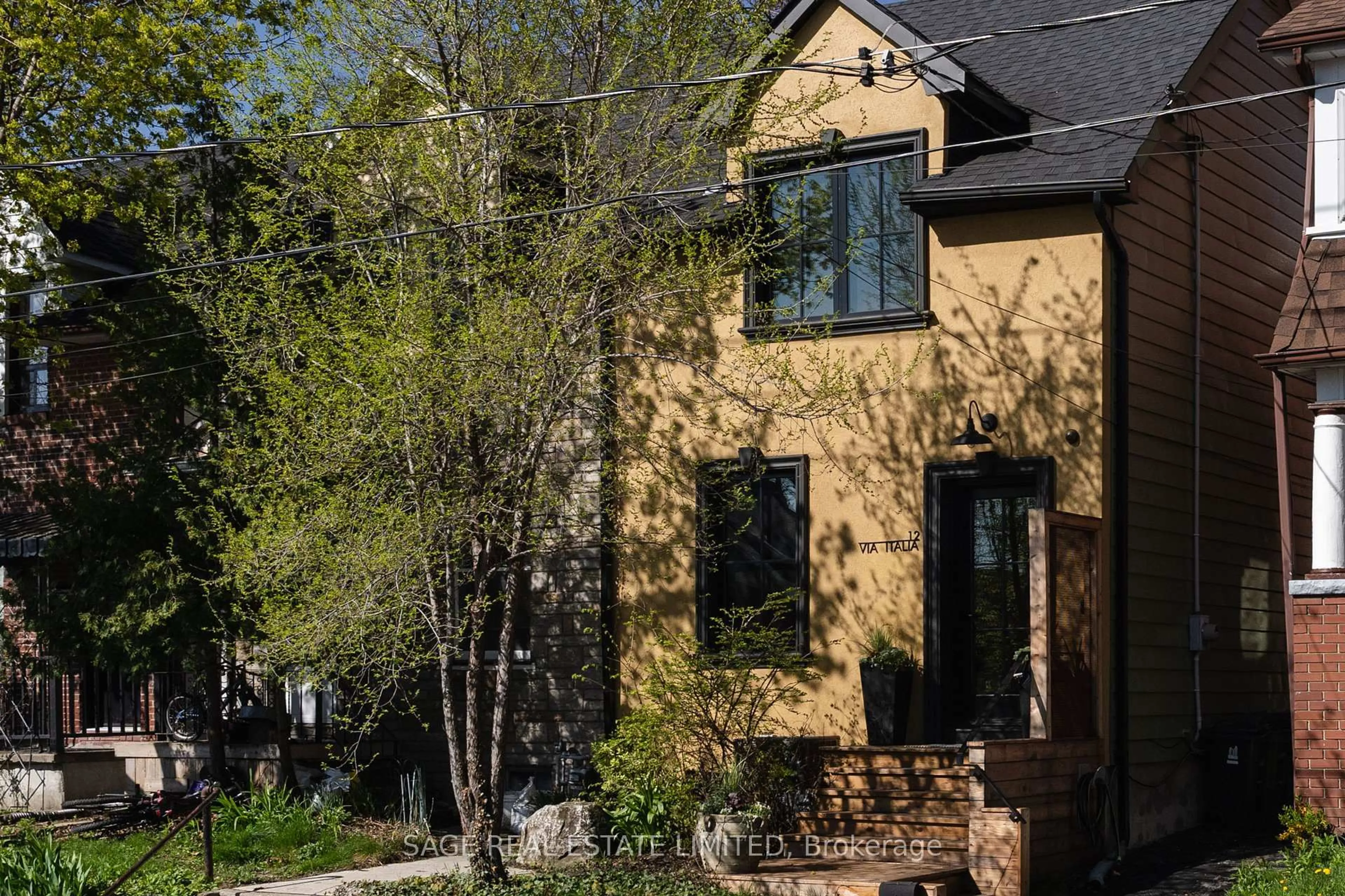 Home with brick exterior material, street for 12 Via Italia, Toronto Ontario M6H 3R2