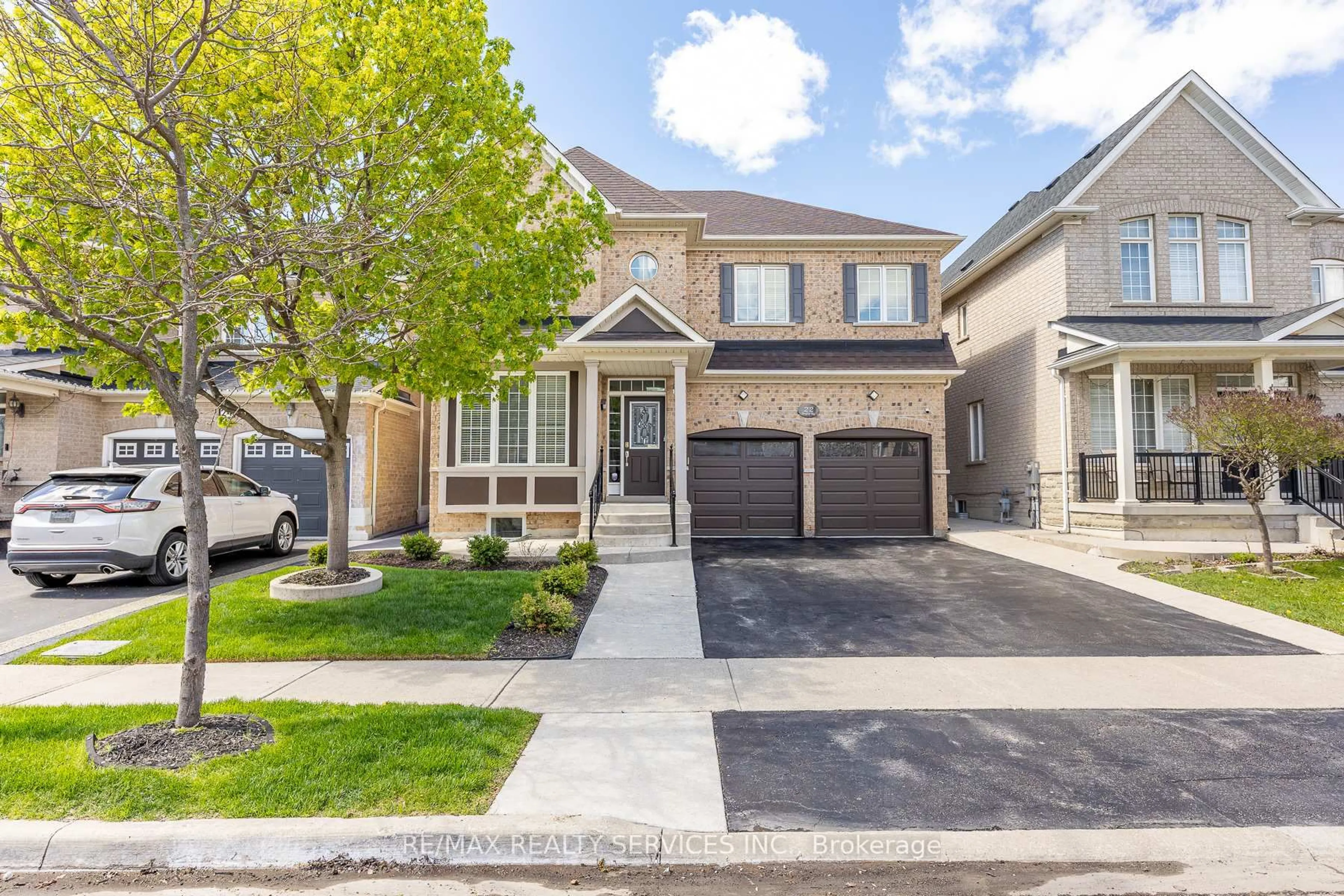 Home with brick exterior material, street for 22 Berryfield Way, Brampton Ontario L6R 0Y2