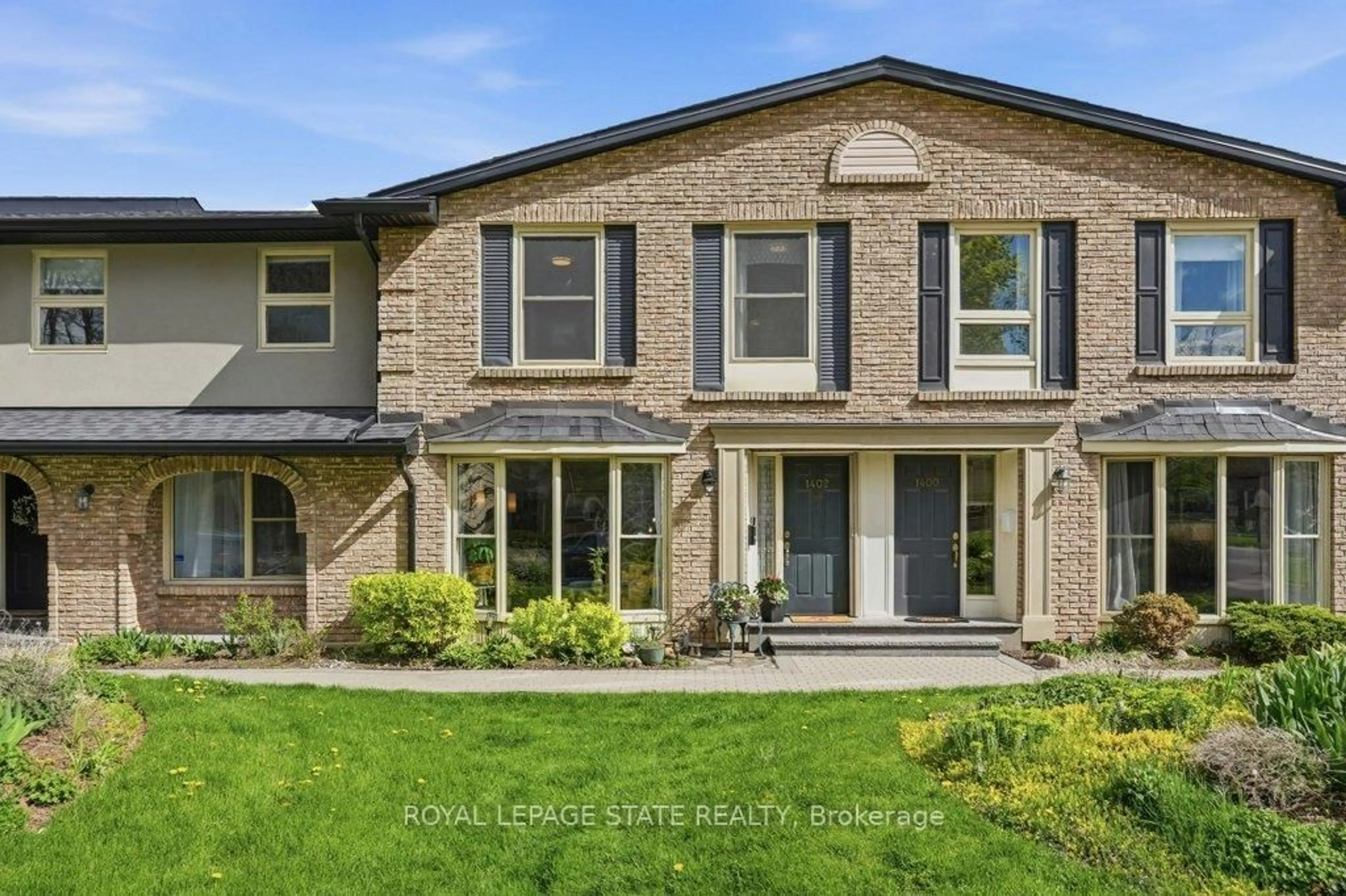 Home with brick exterior material, street for 1402 Ghent Ave #1402, Burlington Ontario L7S 1W8