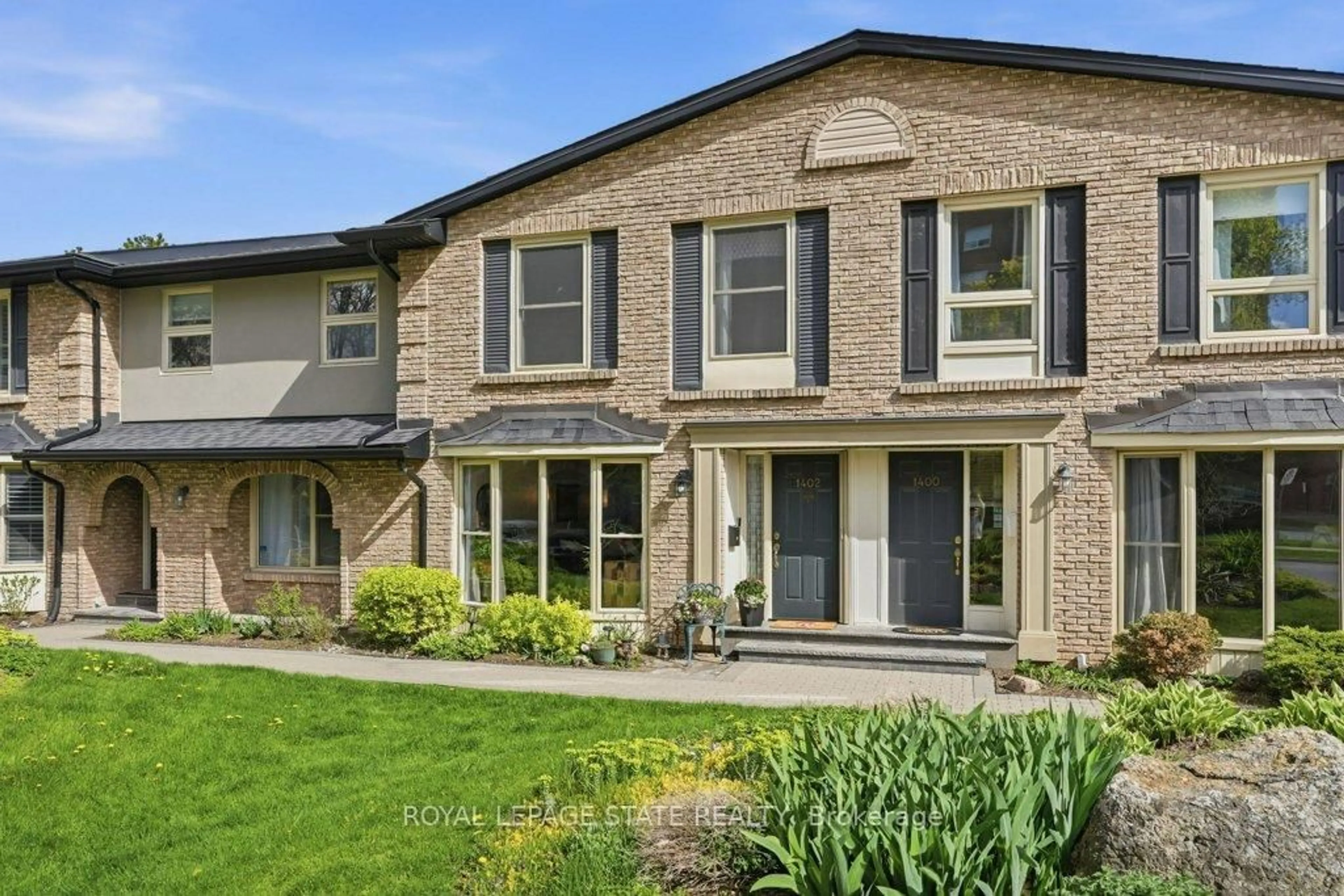 Home with brick exterior material, street for 1402 Ghent Ave #1402, Burlington Ontario L7S 1W8