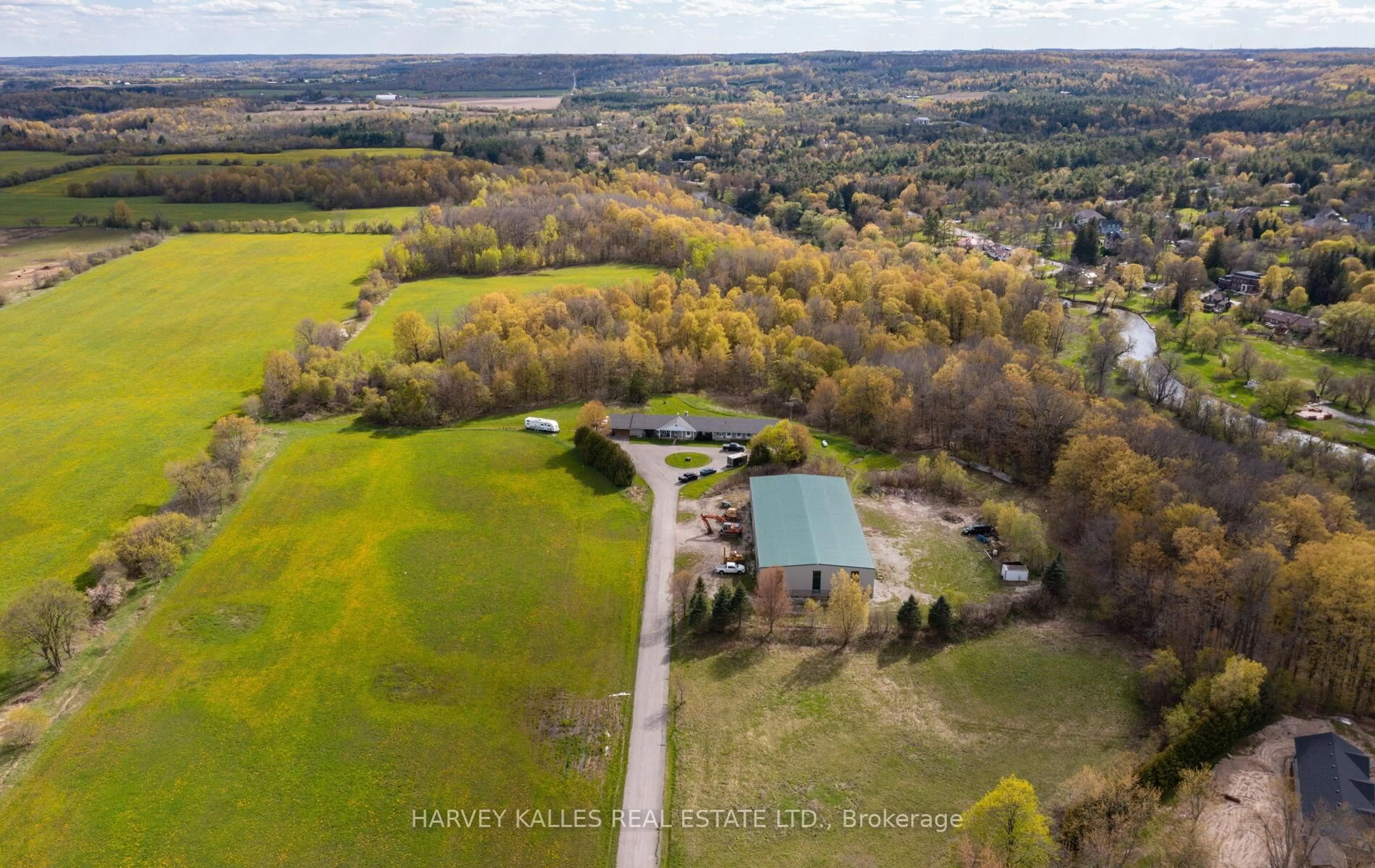 A pic from outside/outdoor area/front of a property/back of a property/a pic from drone, water/lake/river/ocean view for 13820 Heritage Rd, Caledon Ontario L7C 1T5