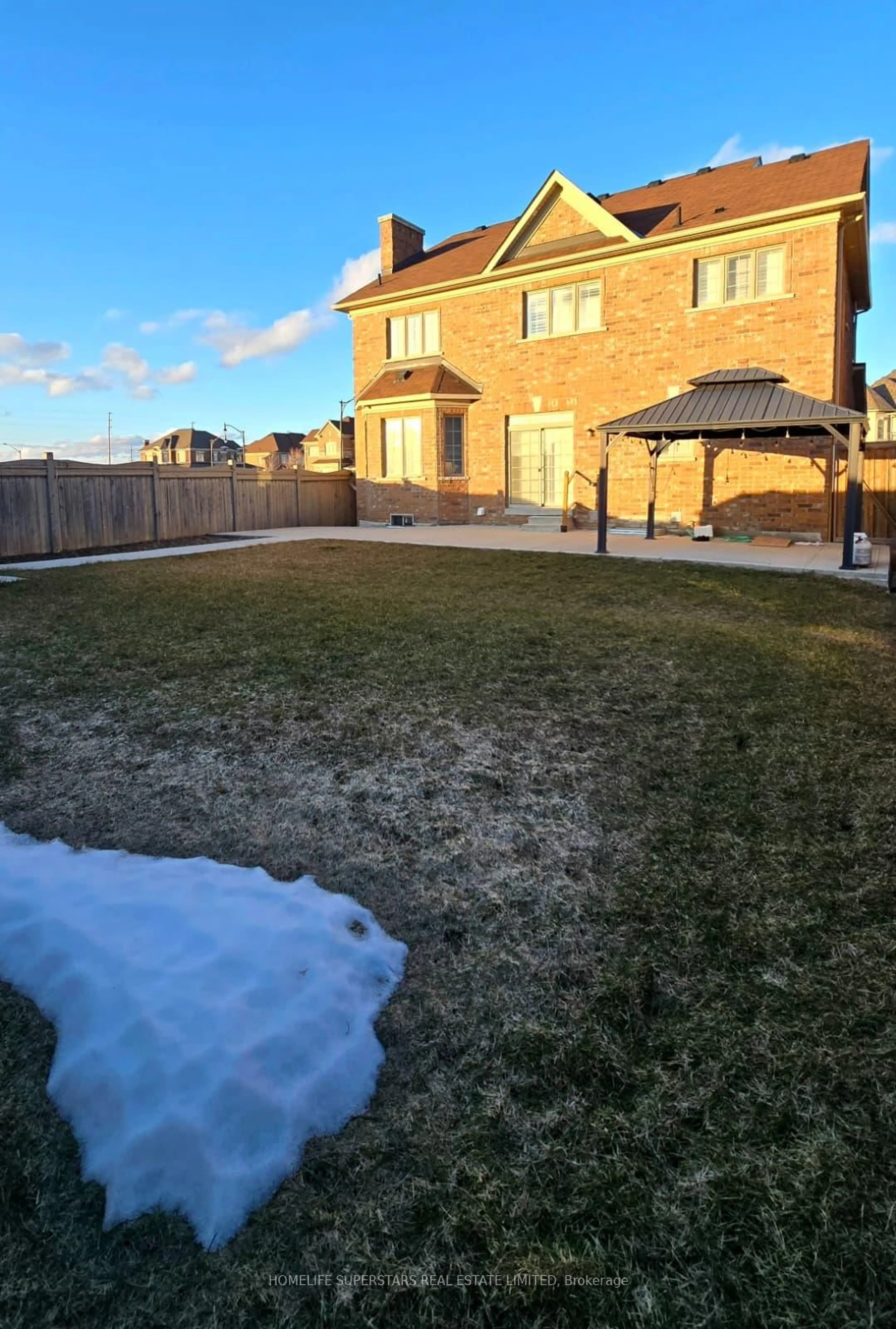 A pic from outside/outdoor area/front of a property/back of a property/a pic from drone, mountain view for 126 Martin Byrne Dr, Brampton Ontario L6P 4C7