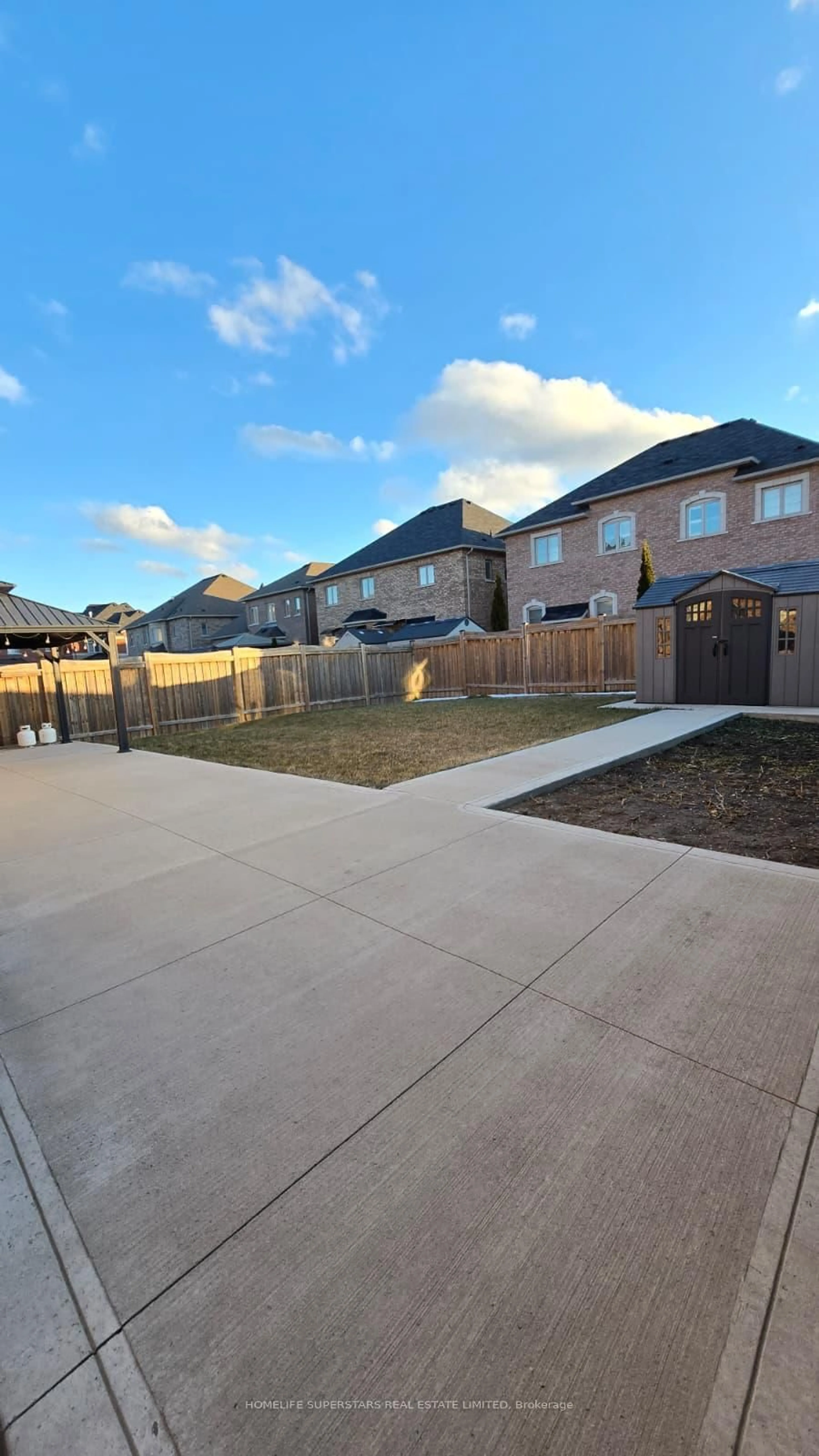 A pic from outside/outdoor area/front of a property/back of a property/a pic from drone, street for 126 Martin Byrne Dr, Brampton Ontario L6P 4C7