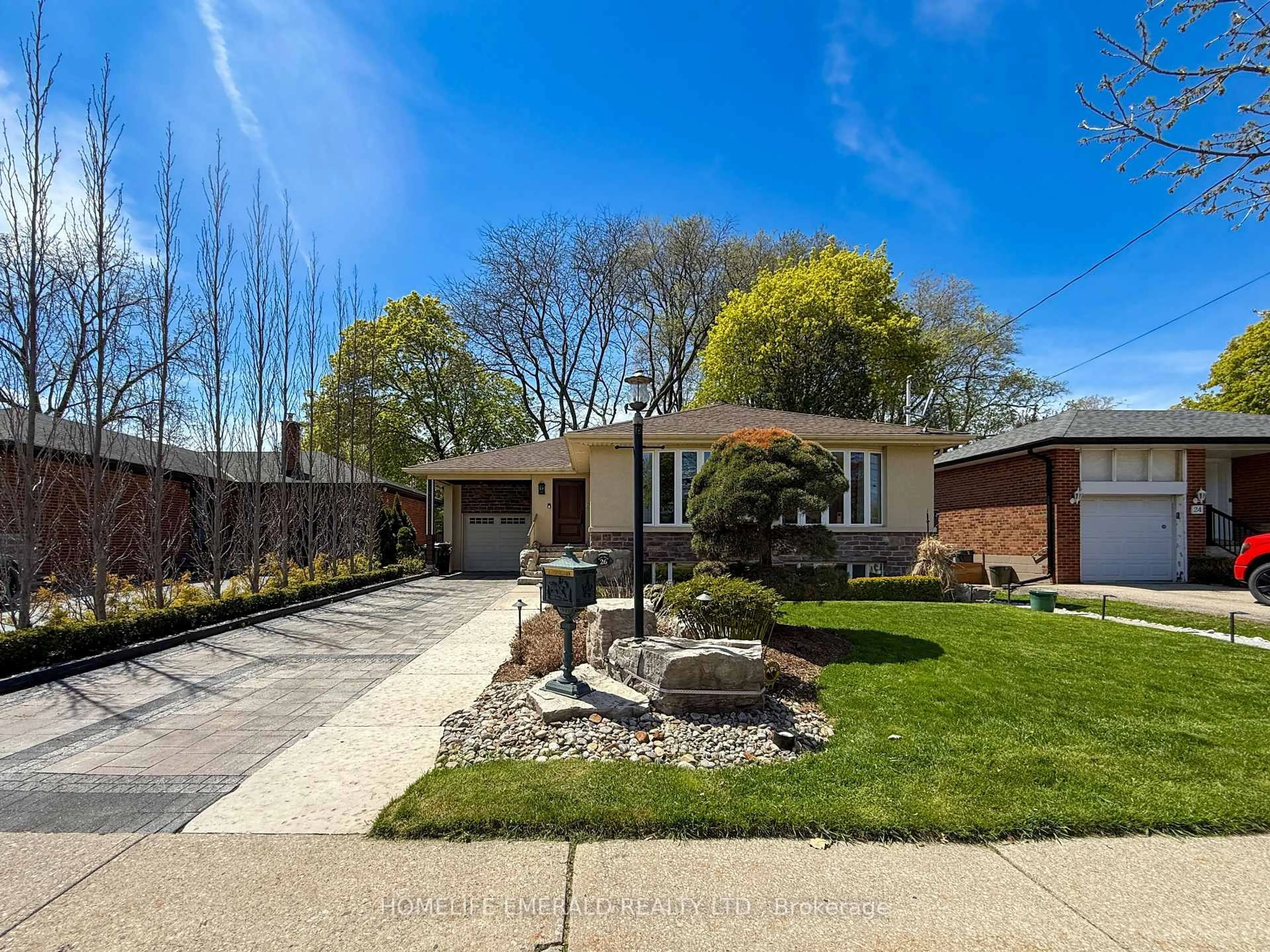 Home with brick exterior material, street for 26 Koos Rd, Toronto Ontario M9C 1W3